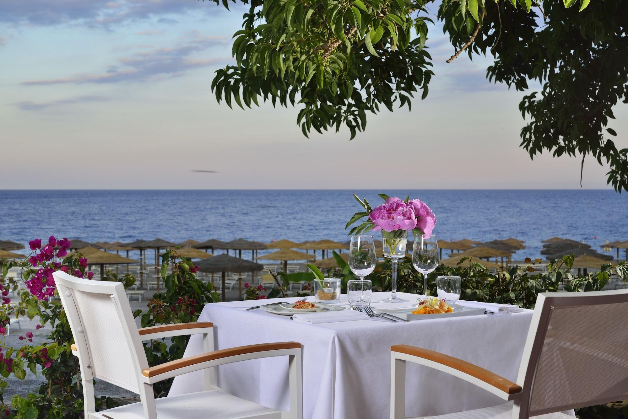 Restaurant UNA Hotels Naxos Beach Sicilia