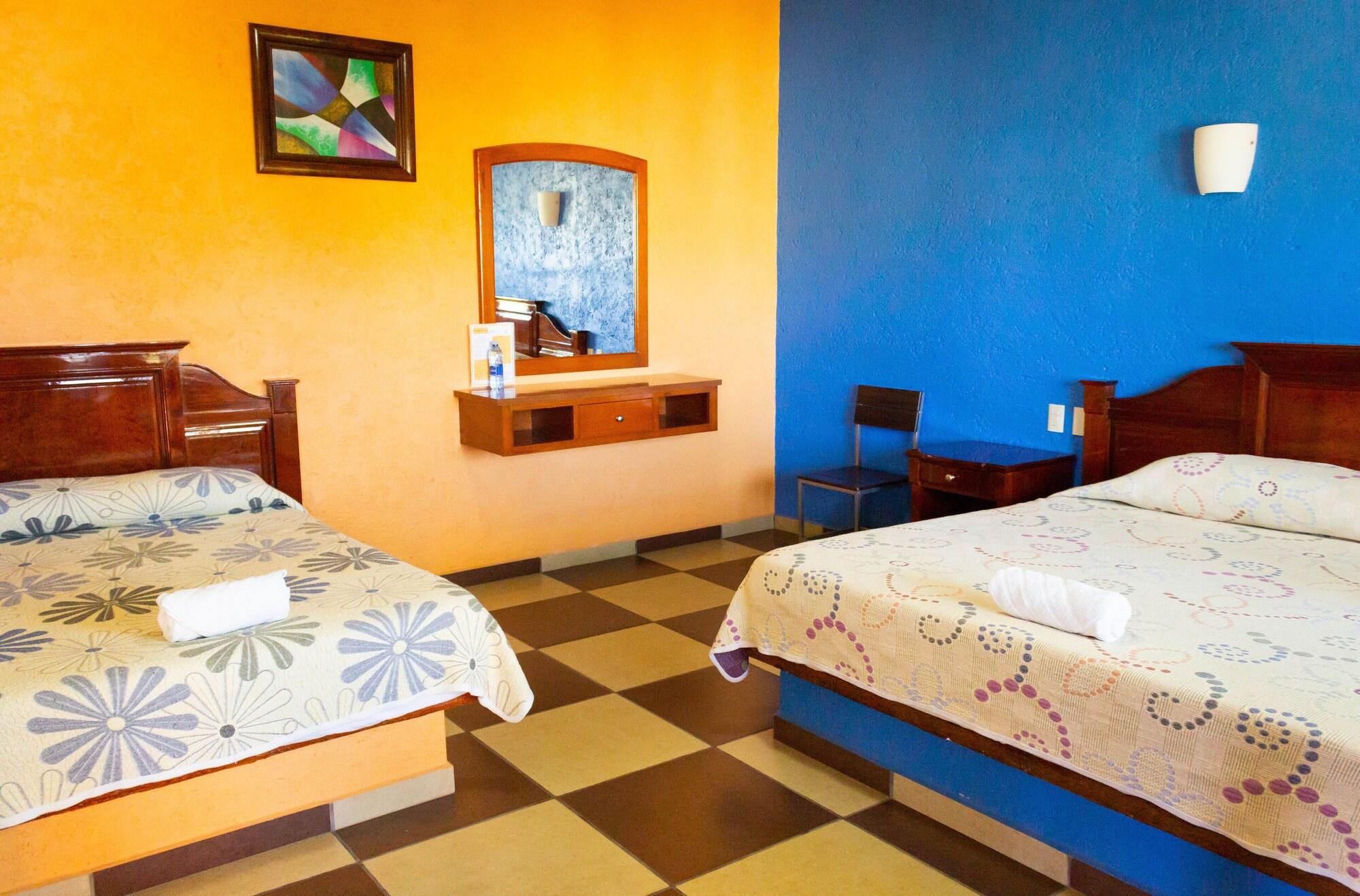 Habitación Villa Jardines