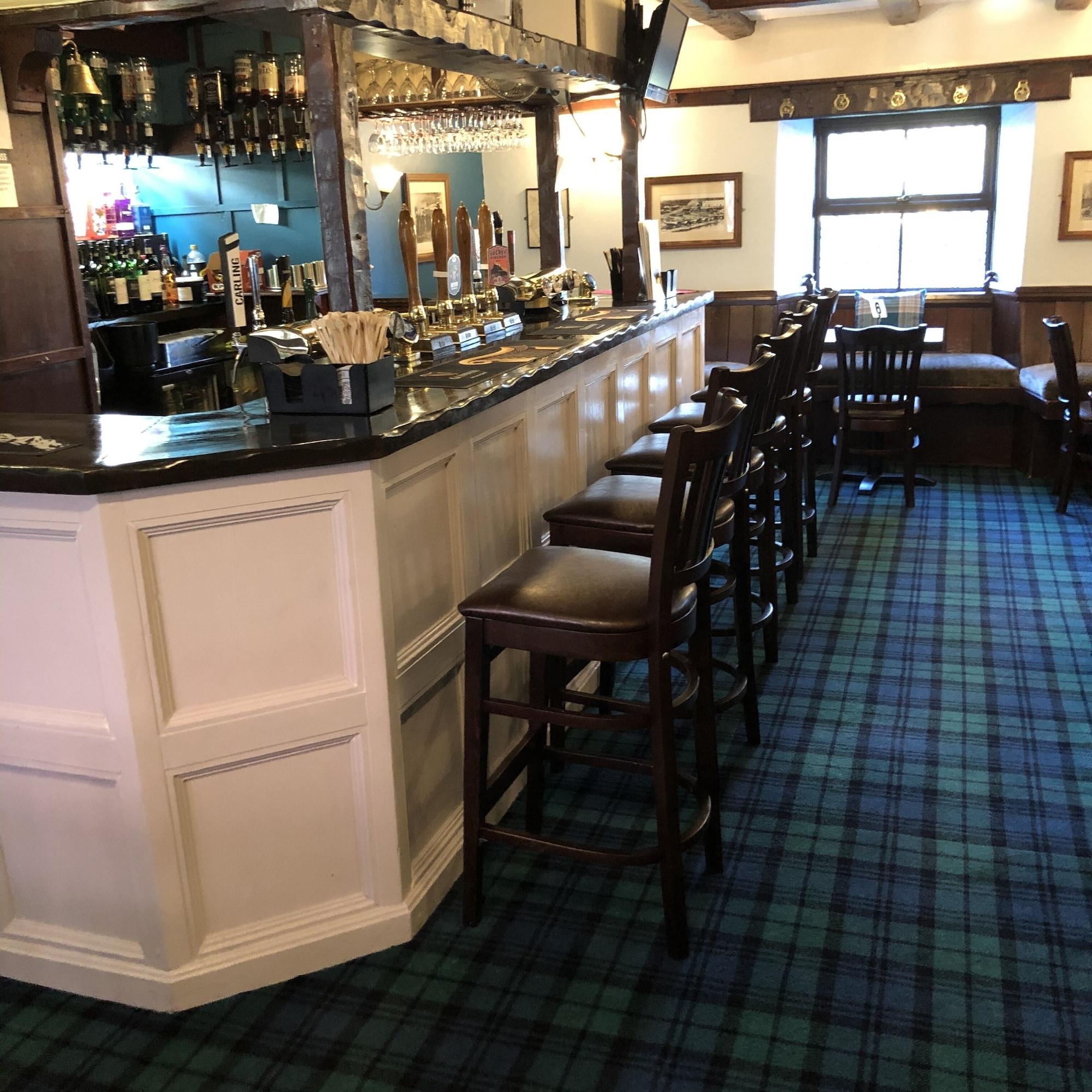 Bar/Salón The Cottage Inn Hotel