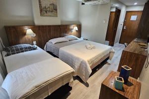 Alojamiento - 611- Flat 3 pessoas garagem e lazer bem localizado