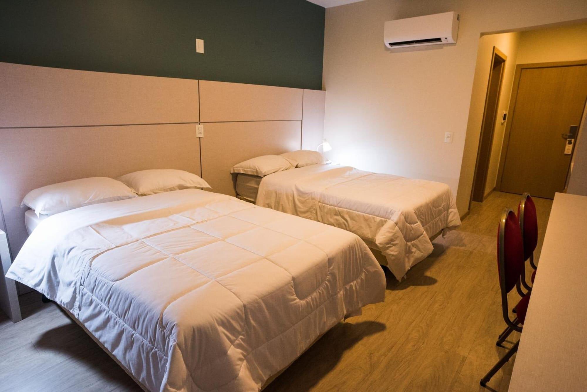 Quarto Maita Palace Hotel