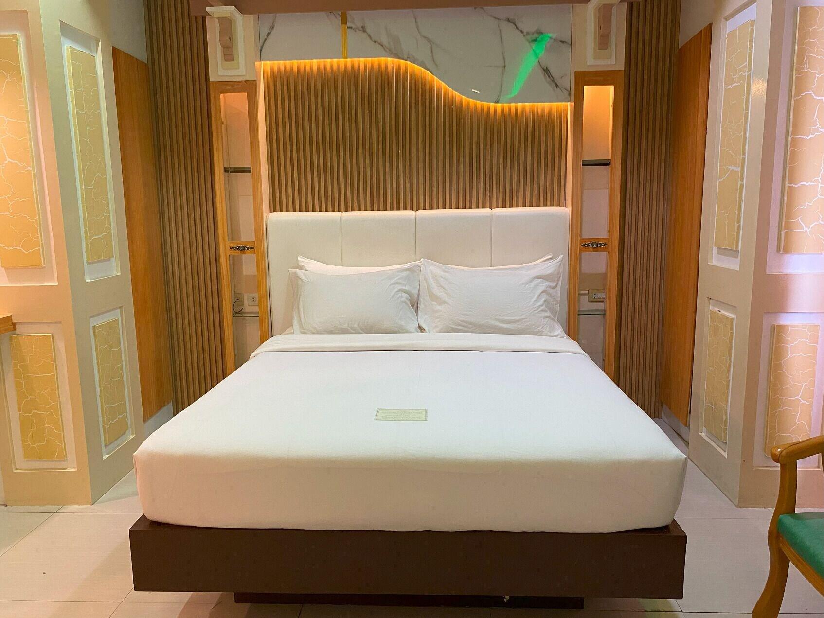 Habitación LM Metro Hotel