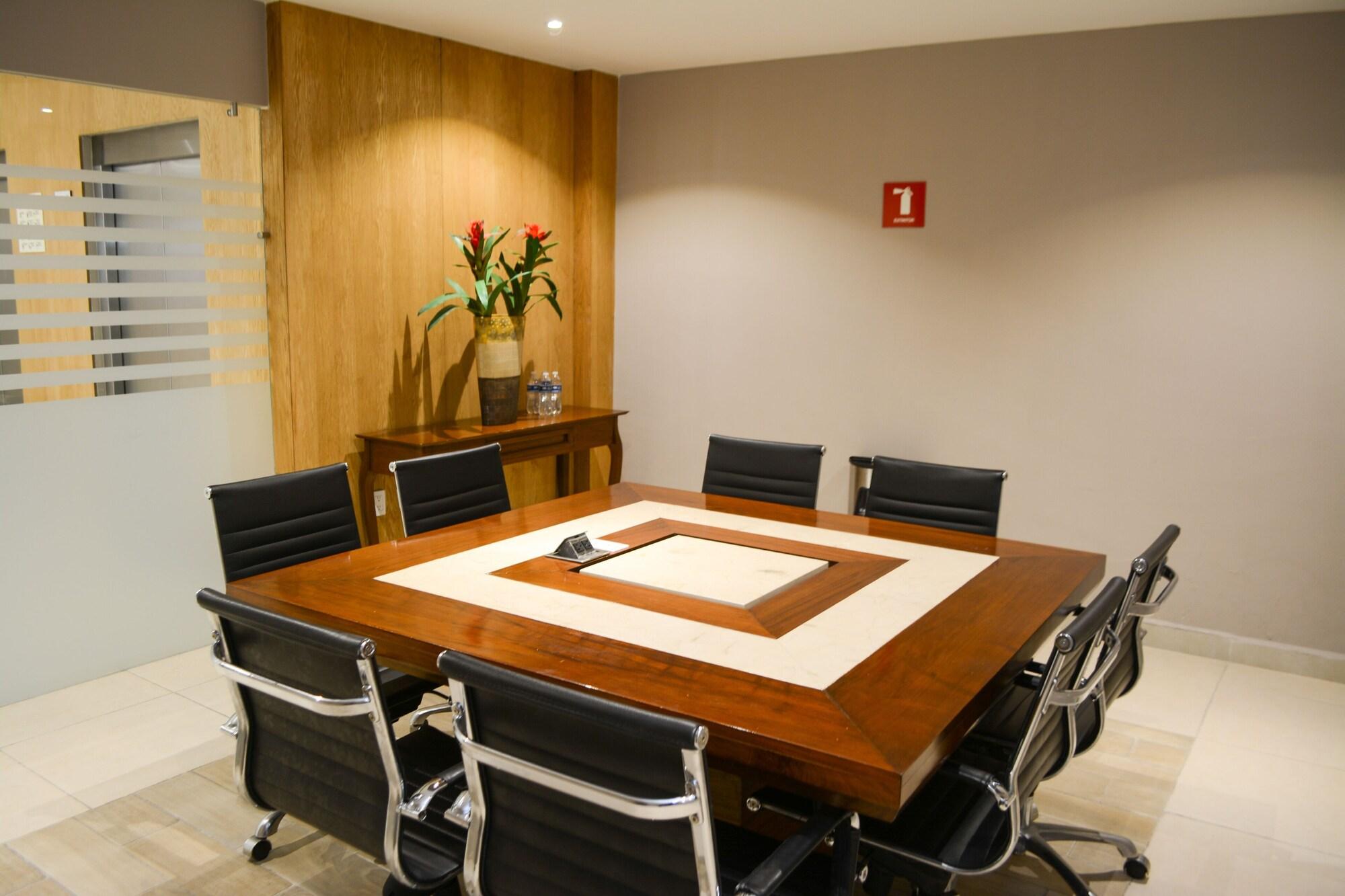 Sala de Reuniones Stain Loft & Suites
