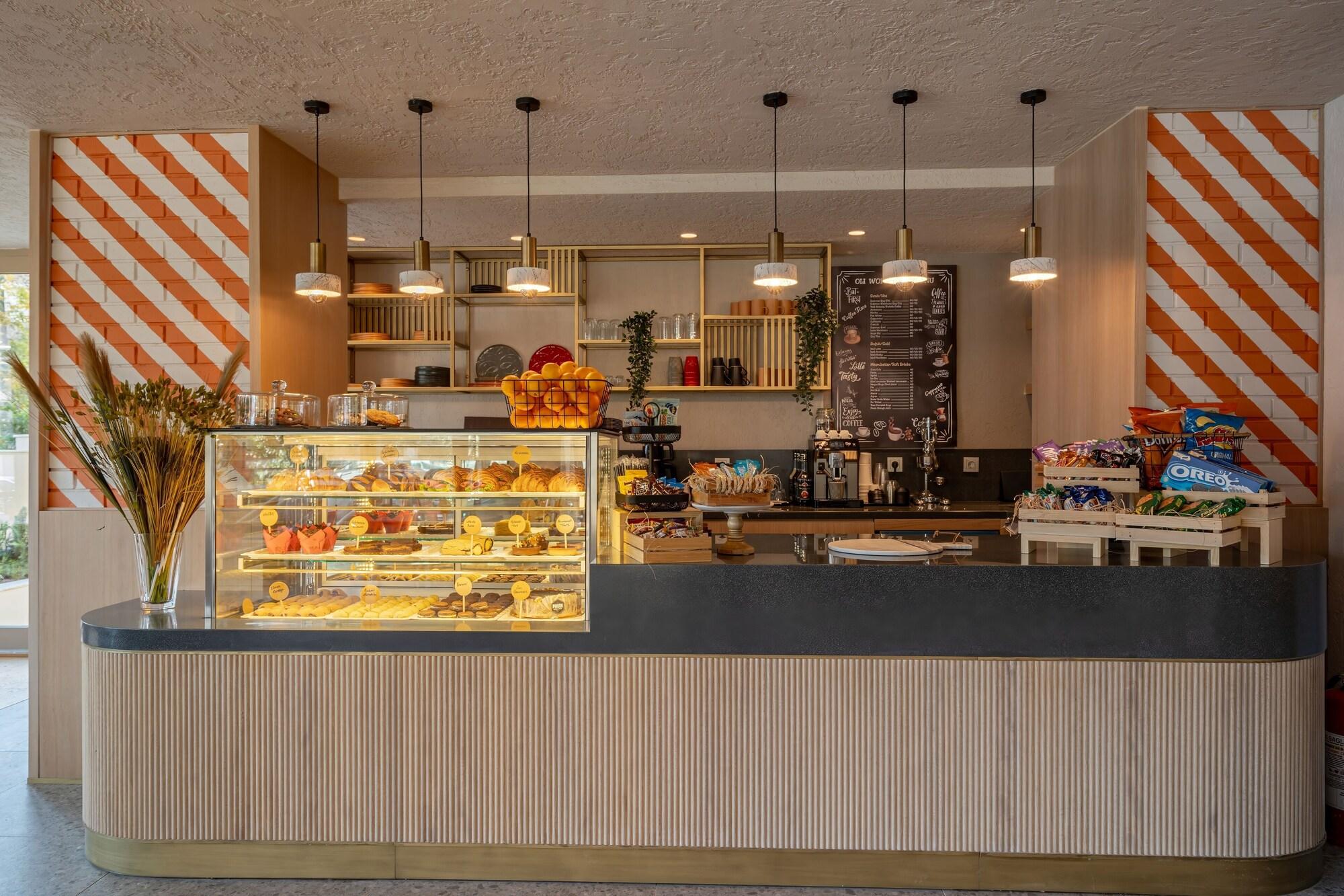 Bar/Salón Oli Hotel And Suites