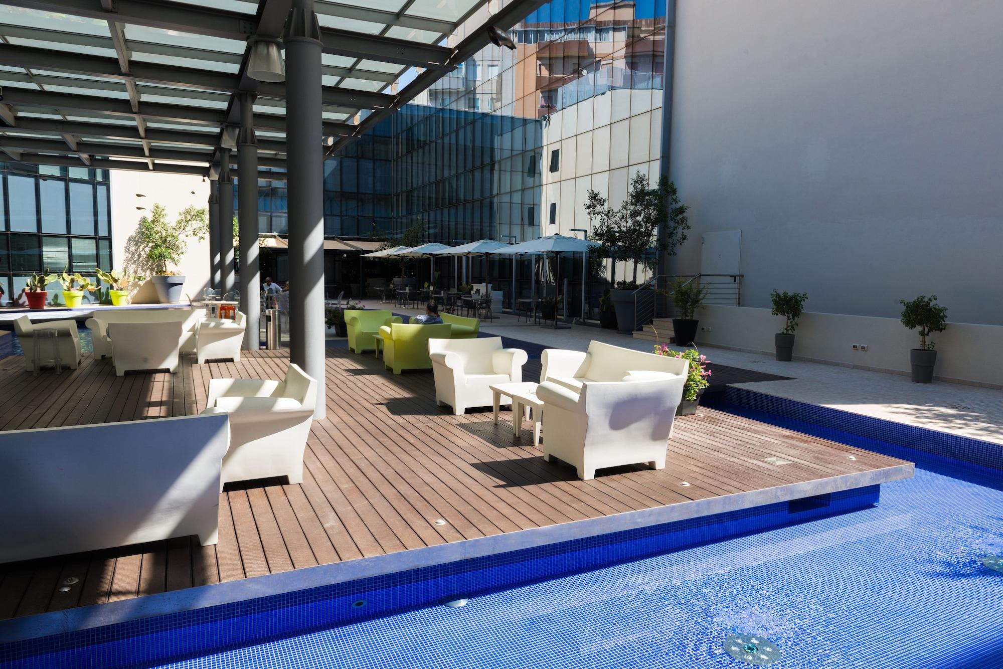 Vista Exterior UNA HOTELS T Hotel Cagliari