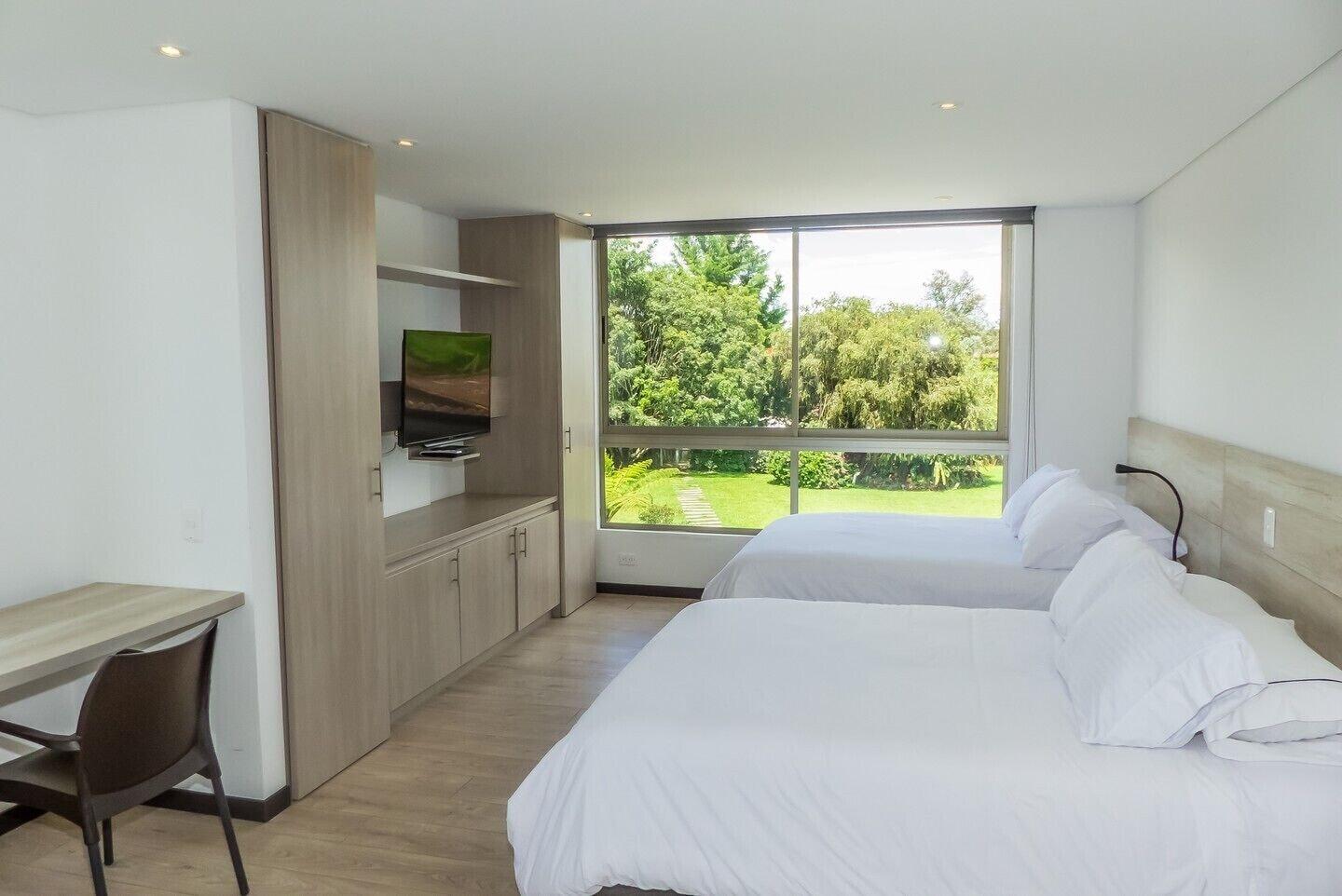Habitación MG Hotels & Suites