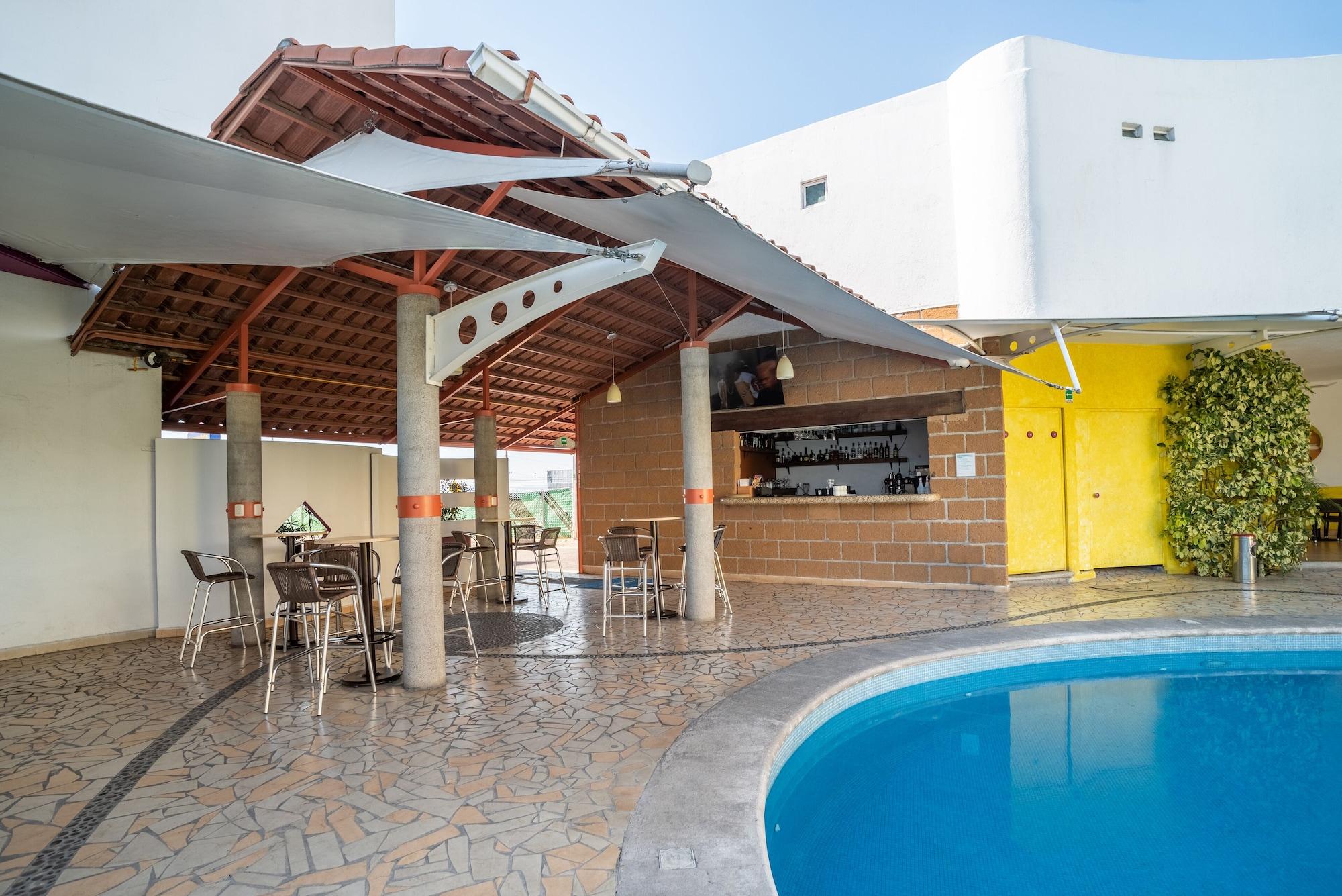 Bar/Salón Hotel Mágico Inn