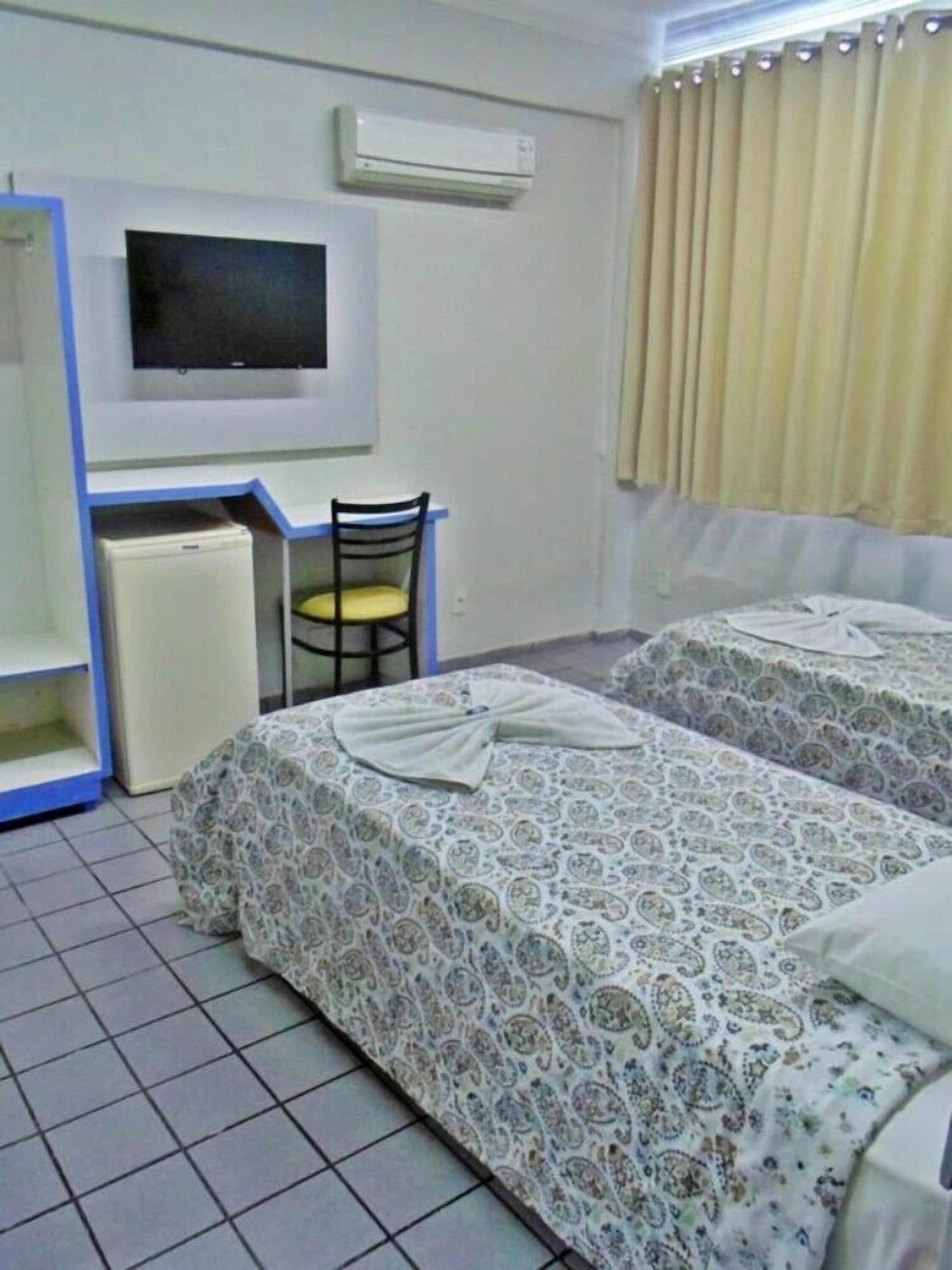 Quarto Titao Plaza Hotel