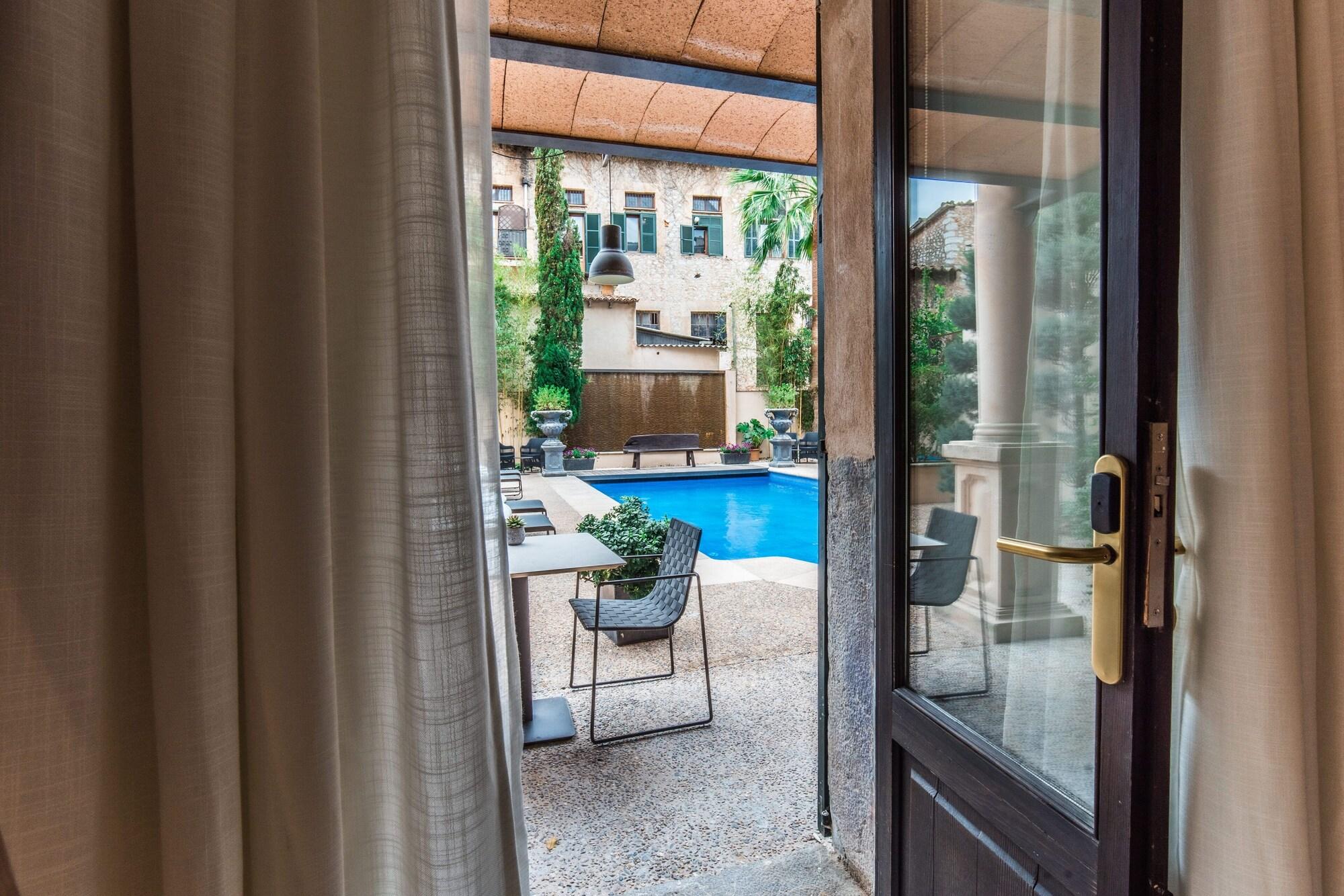 Habitación L'Avenida Hotel