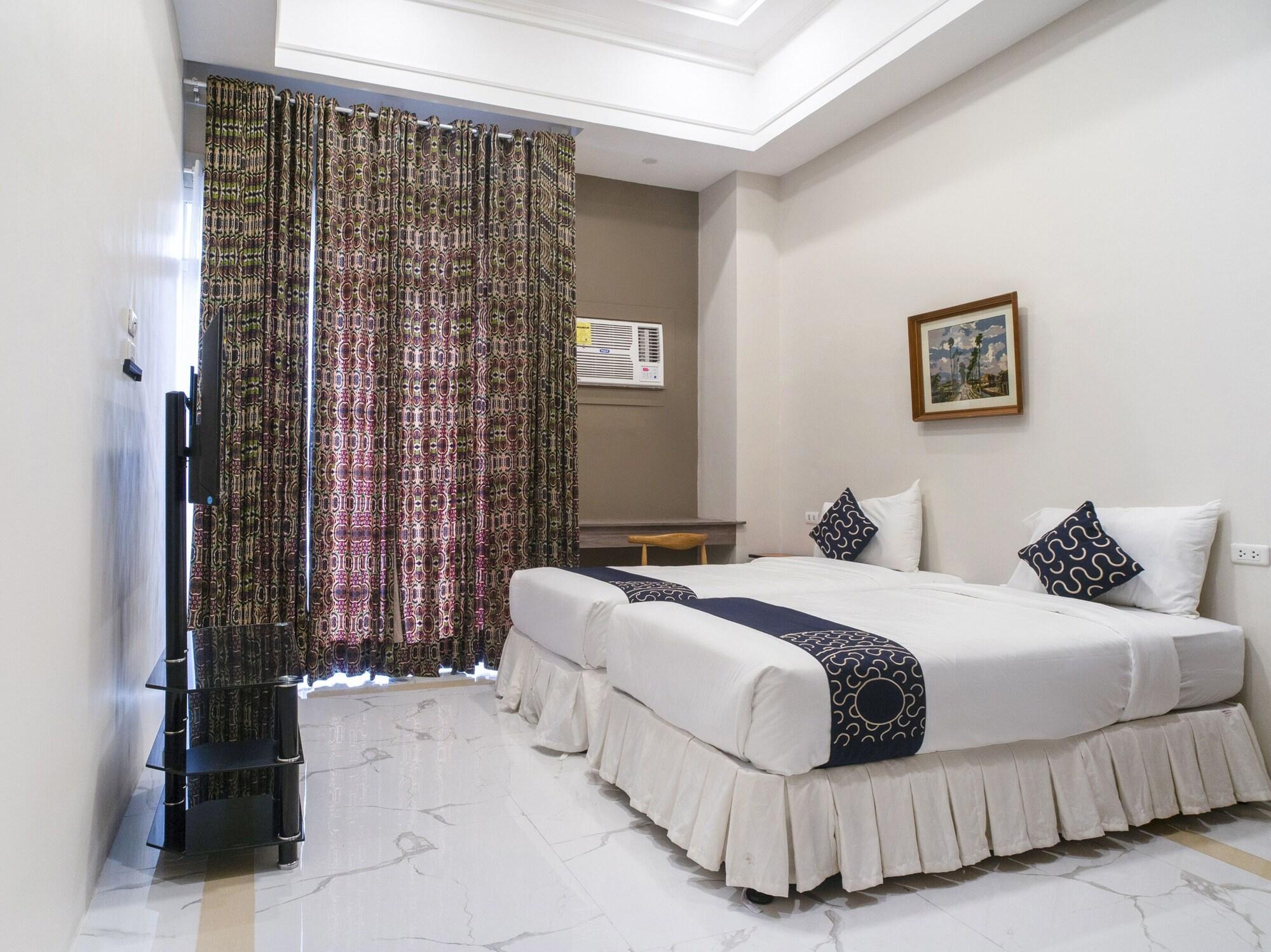 Habitación Capital O 460 World Palace Hotel