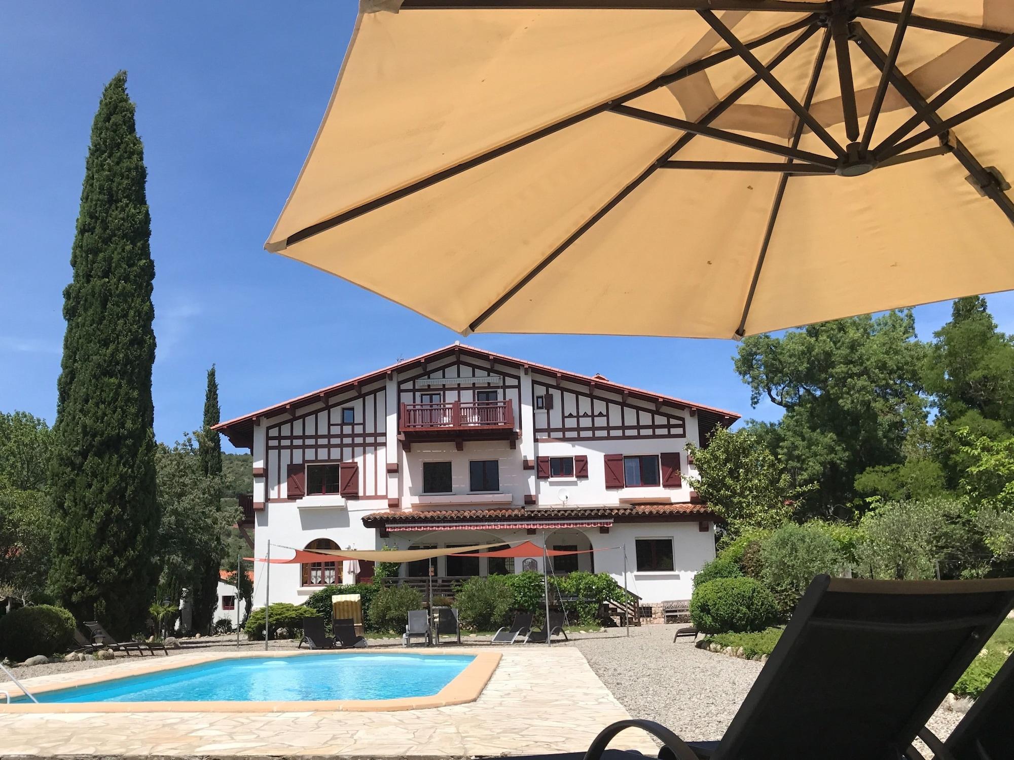 Vista Piscina Villa du Parc