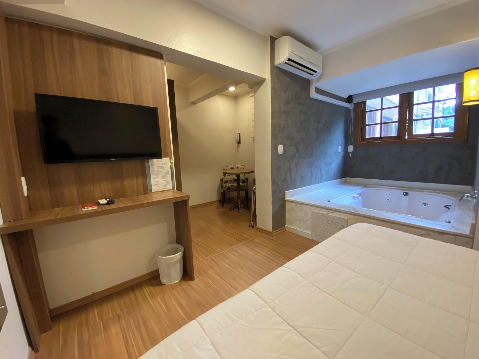 Comodidades do quarto Pousada Stillo Gramado