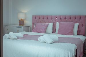 Alquiler Vacacional - 2-bedroom apartment in charming Kilamba with WiFi, AC. Relax and enjoy