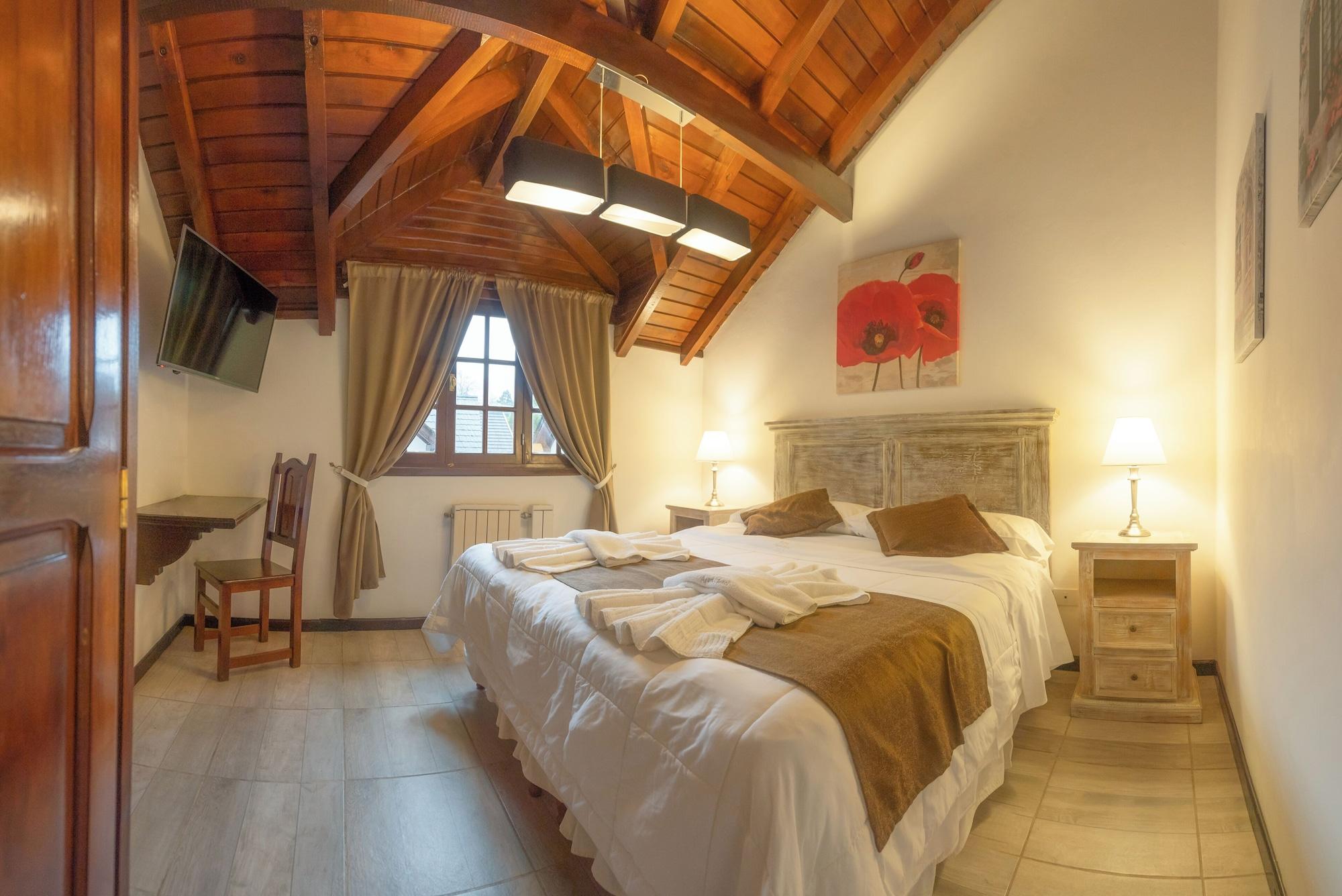 Habitación La Fontaine Apart y Hotel