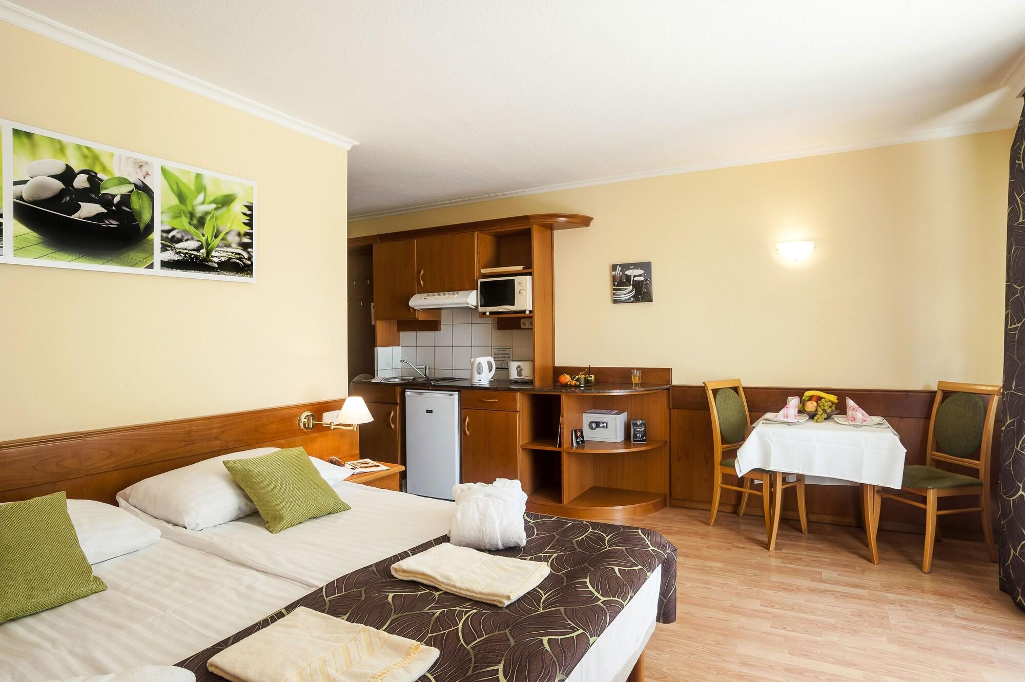 Habitación Holiday Club Apartman Hotel