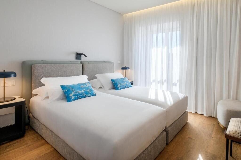 Habitación MouraSuites Hotel