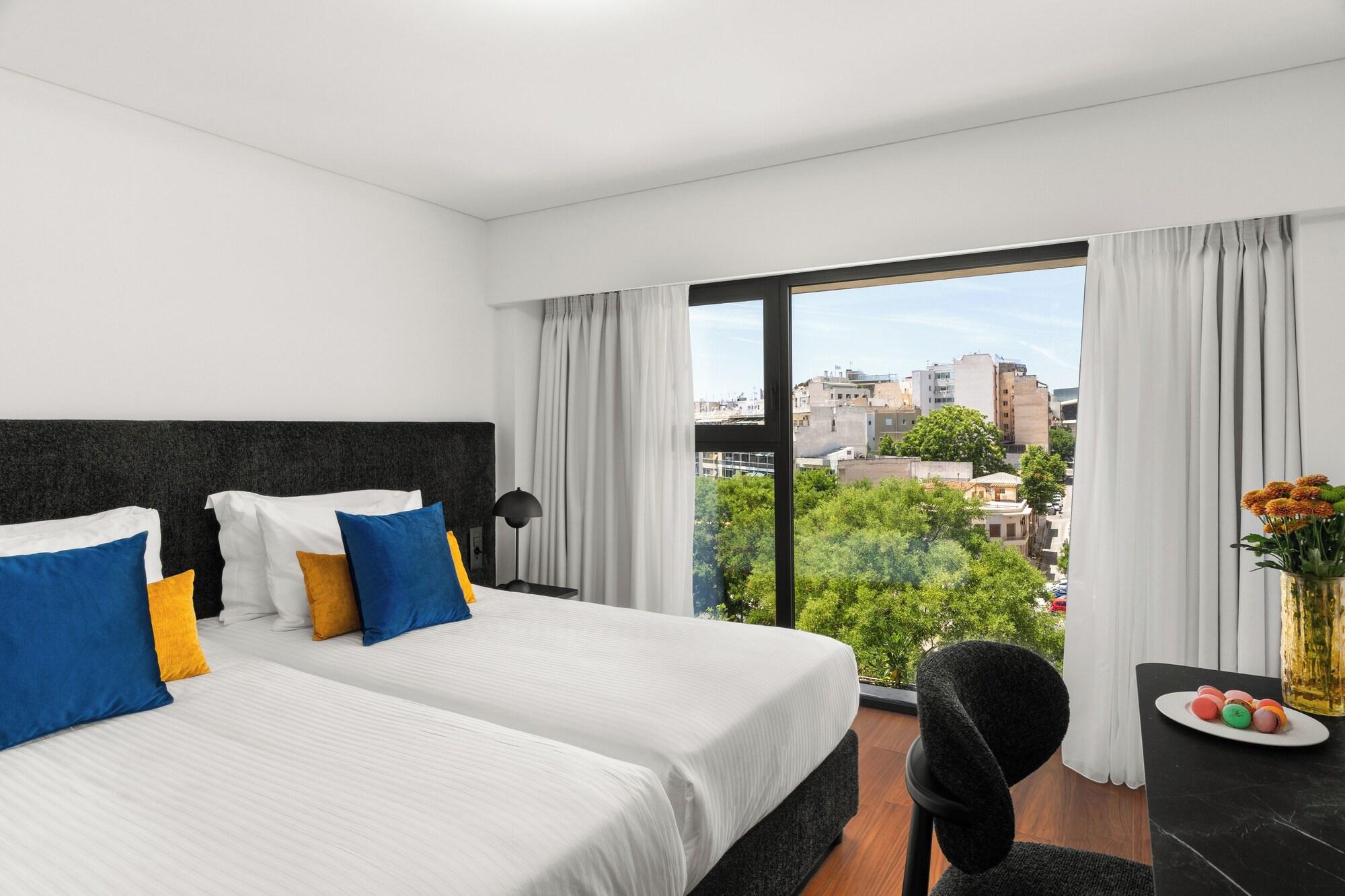 Habitación The Athenaeum Luxury Hotel