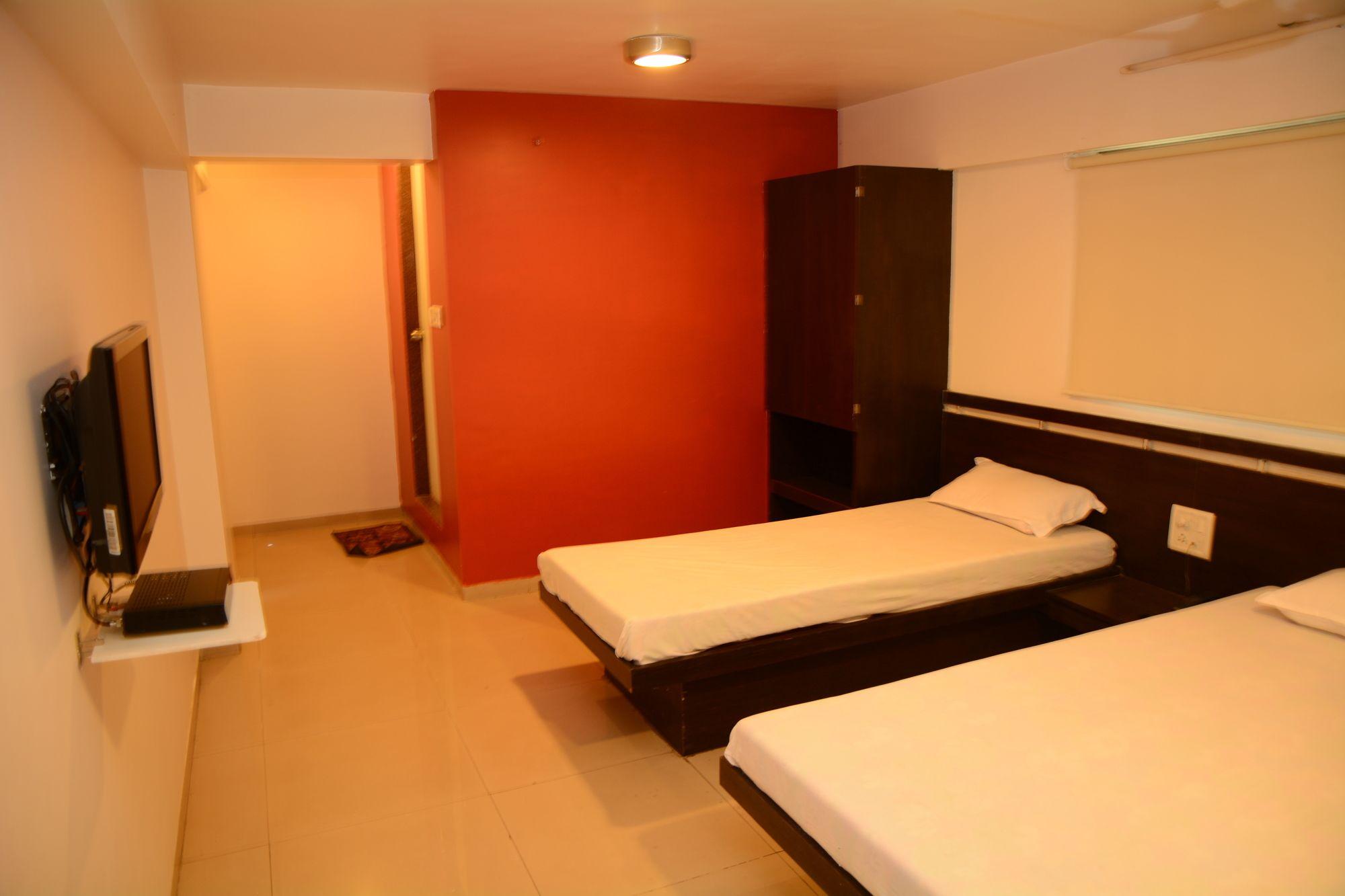 Habitación Hotel Palms Residency