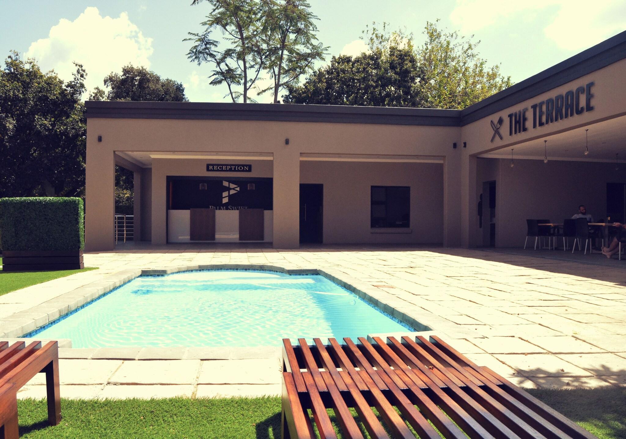 Vista Exterior Palm Swift Luxury Accommodation