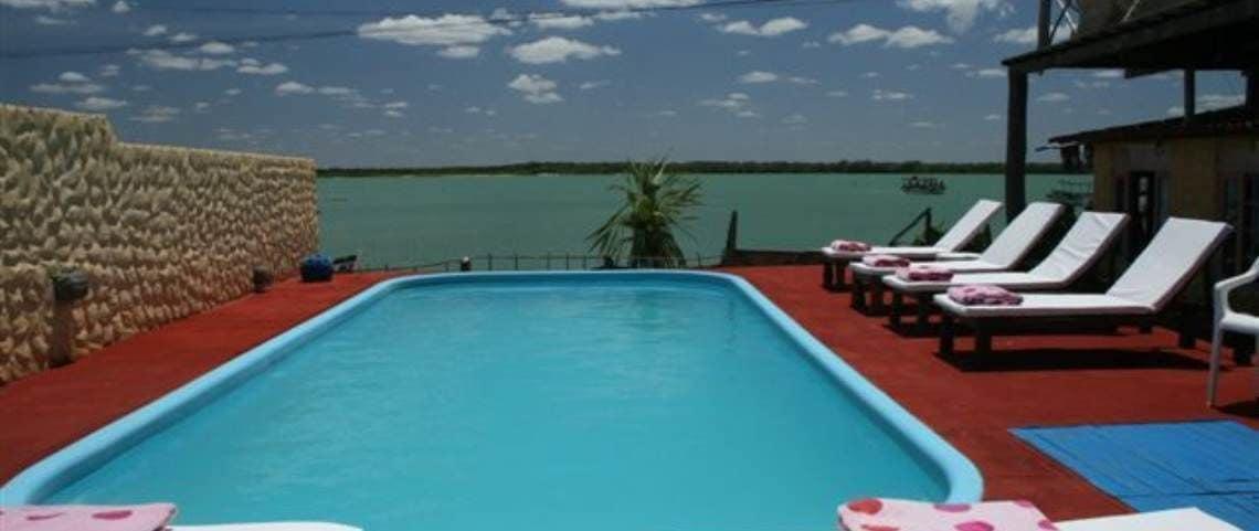 Vista Piscina Chalé Oásis