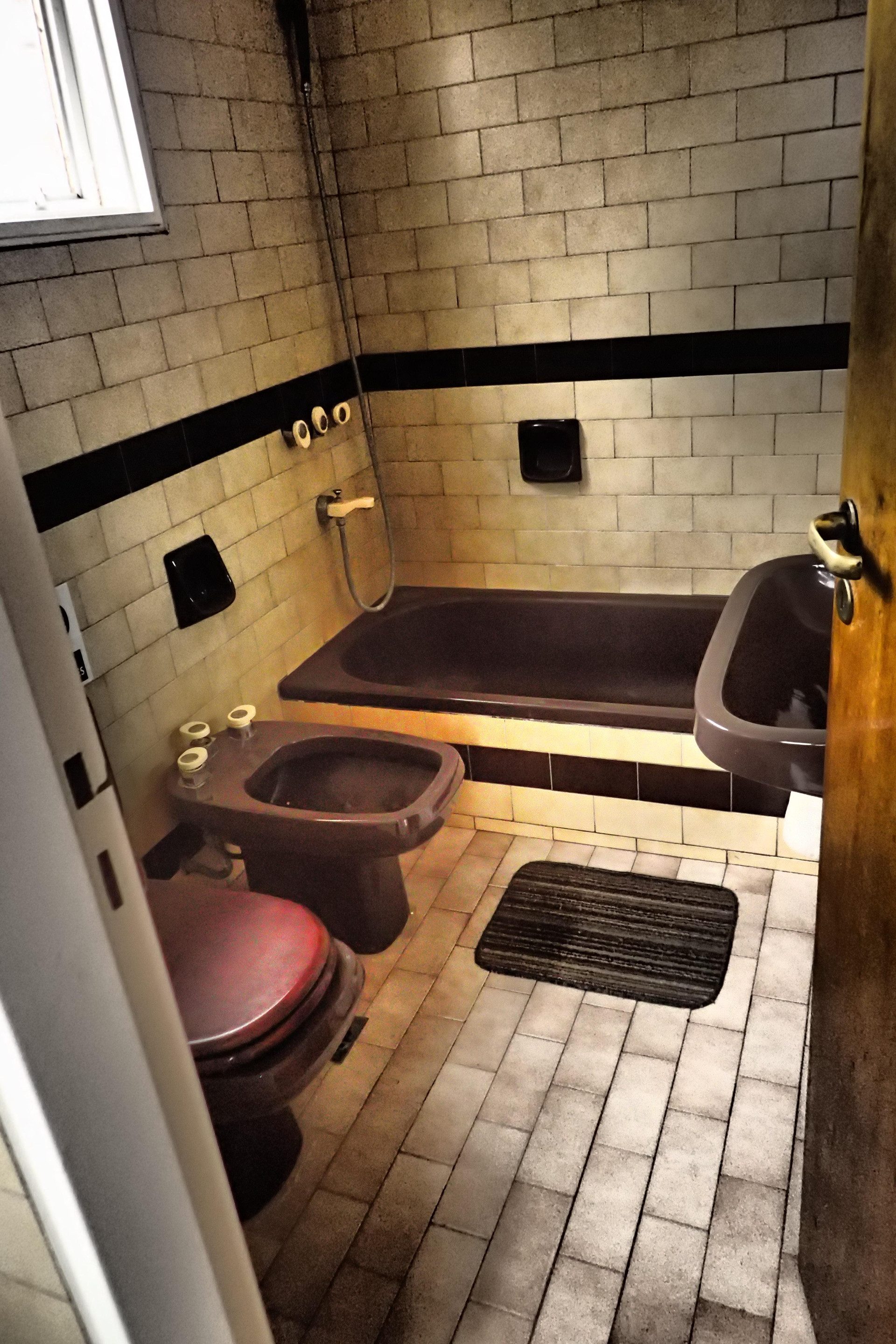 Baño Open House Hostel