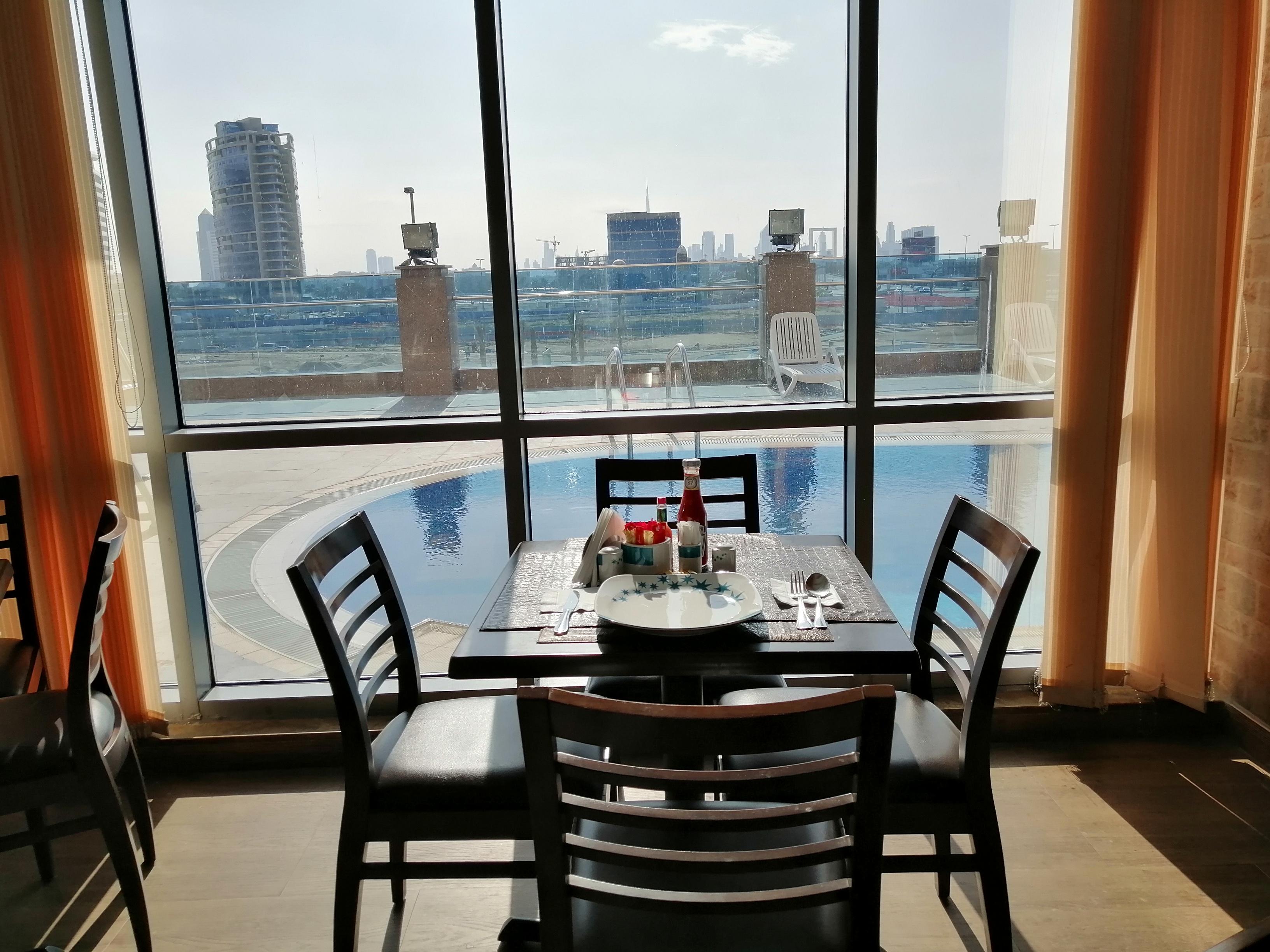 Restaurant Tulip Creek Hotel Apartments