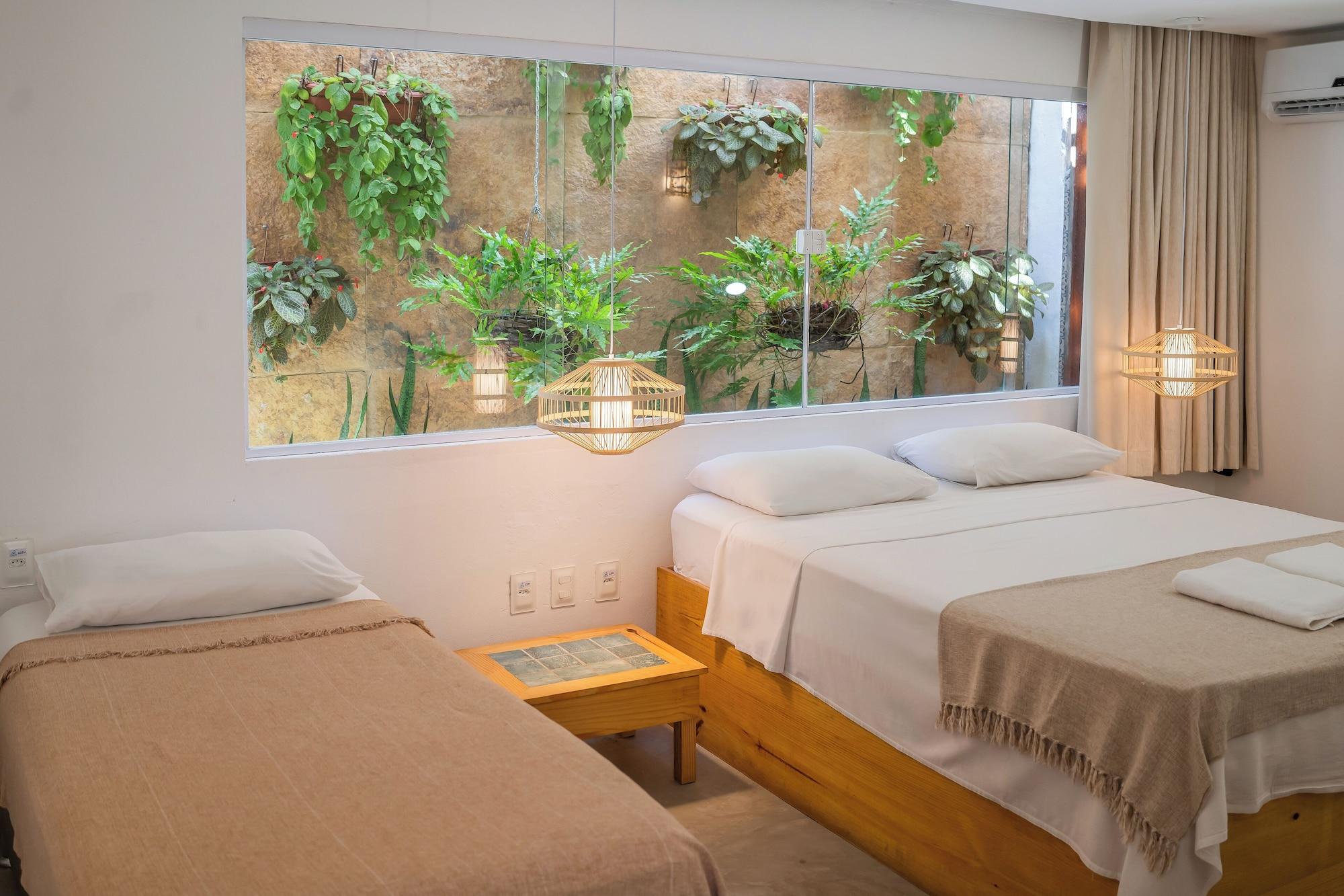 Quarto Pousada Chez Toi