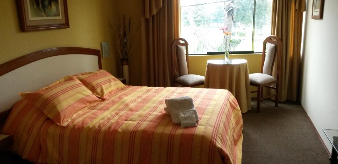 Habitación Solid Gold Hotel