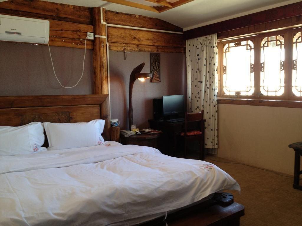 Habitación Lijiang Taohuadao Post Inn