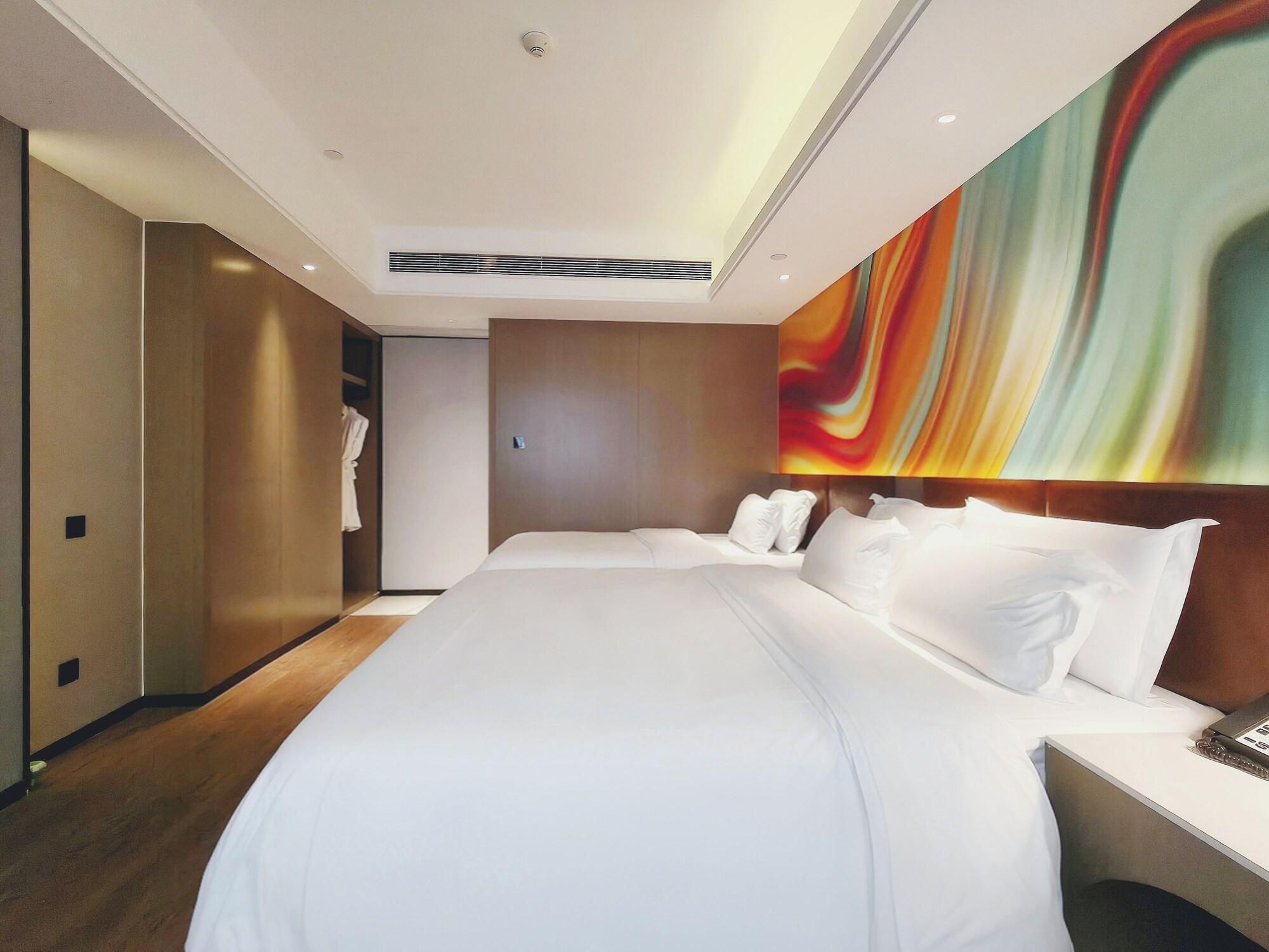 Habitación Ramada Encore International Hotel Jiangnanxi Metro Station Branch - Free Shuttle Bus to Canton Fair Complex During Canton Fair Period