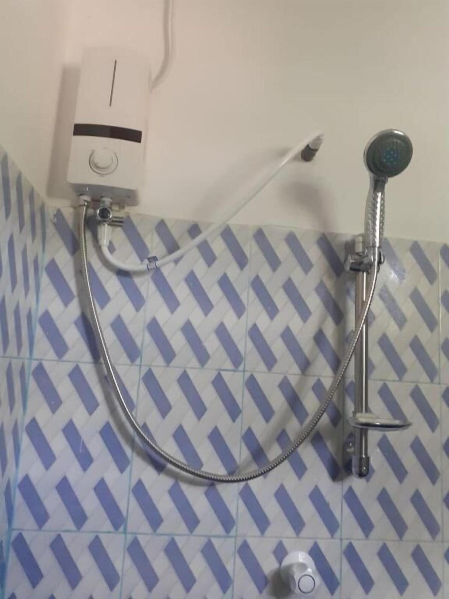 Equipamiento de Habitación Ishitha Homestay