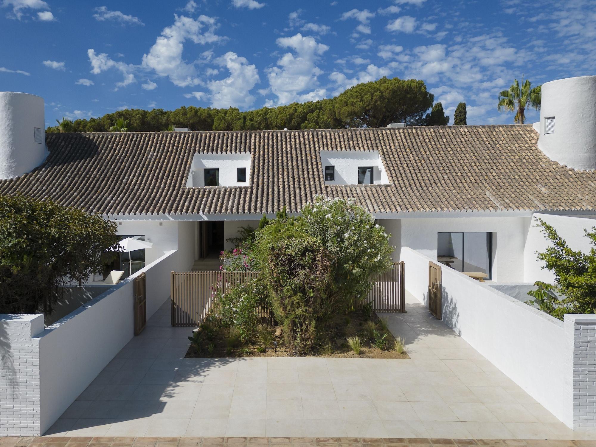 Vista Exterior Anfitria N Villas Suites