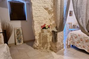 Alquiler Vacacional - Trulli Bianchi. Characteristic stone trullo with private pool and panoramic view