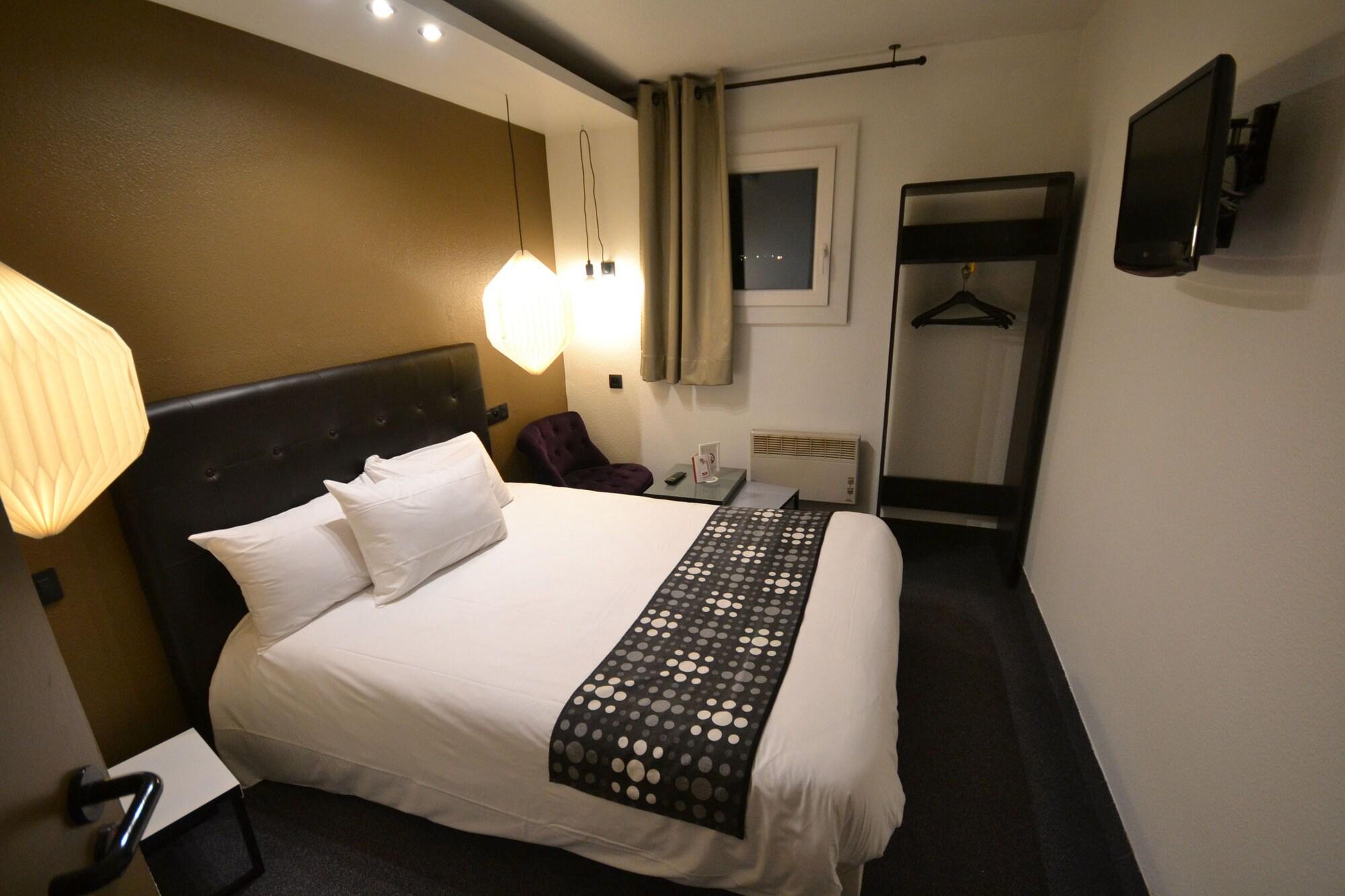 Habitación Brit Hotel Baillet en France