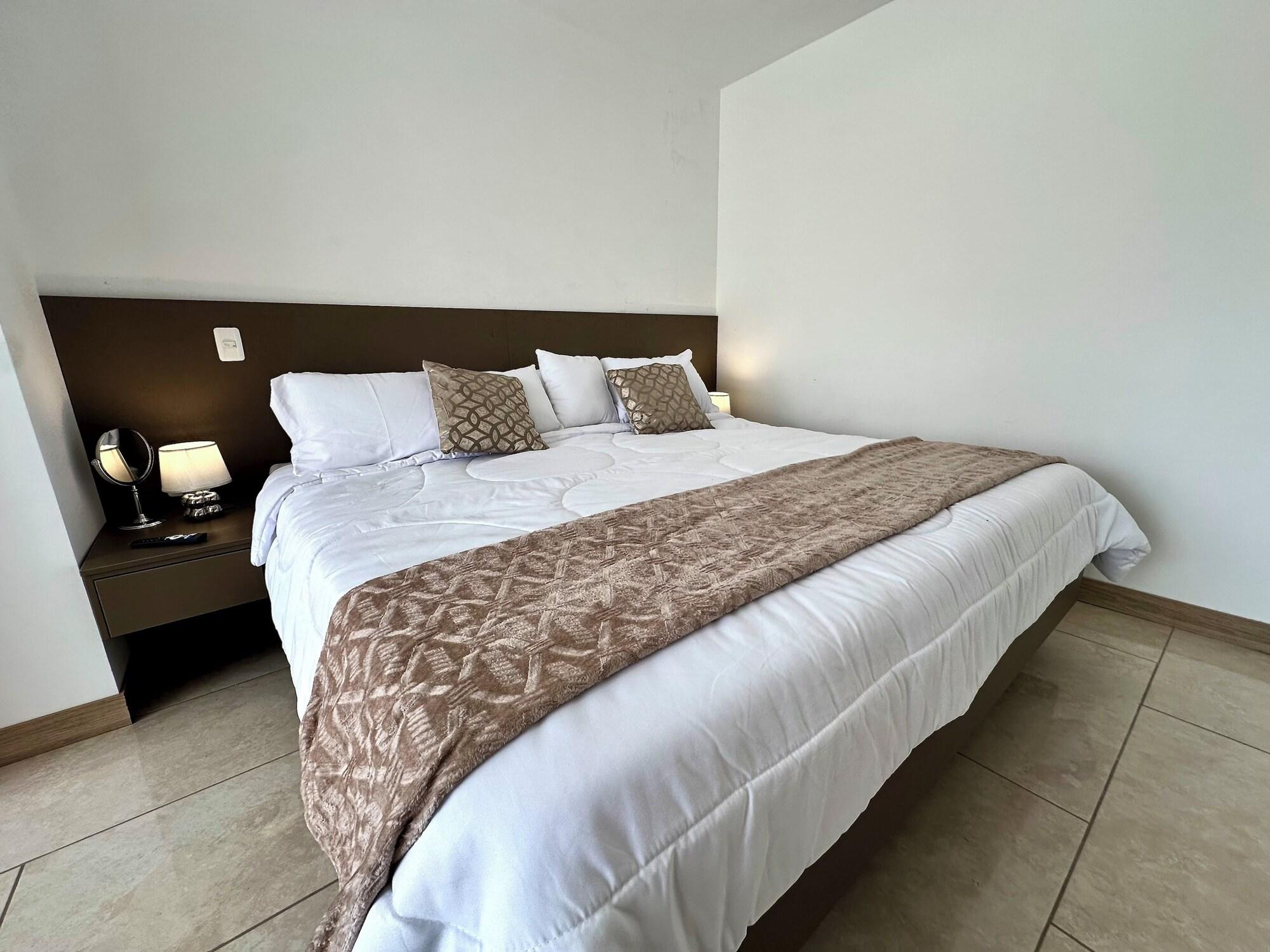 Habitación Urbanizable Suites UIO