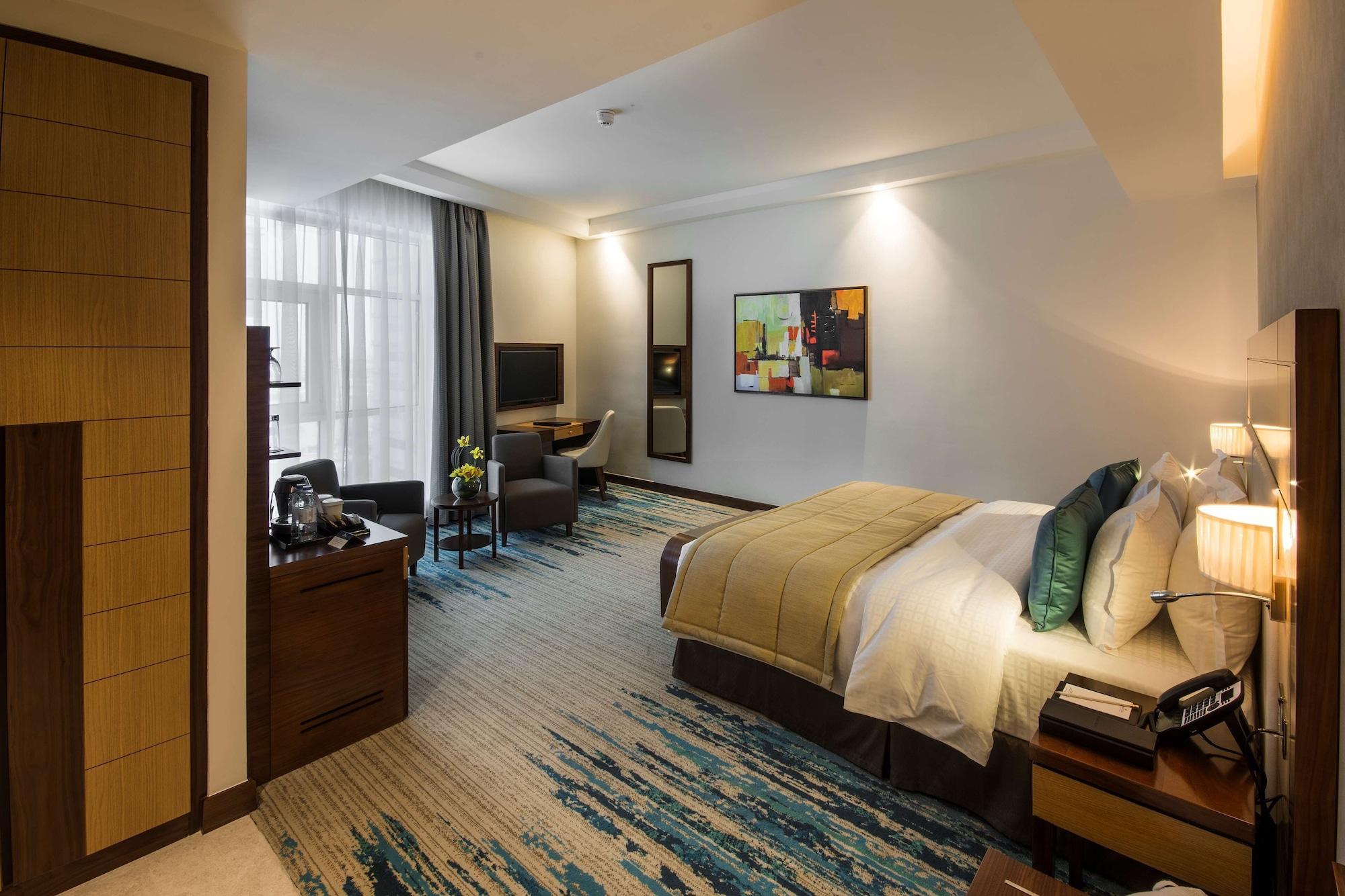 Habitación Golden Tulip Media Hotel