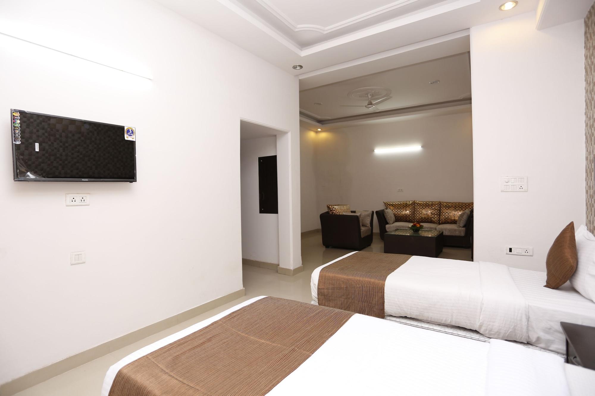Habitación Mint City Center Suites