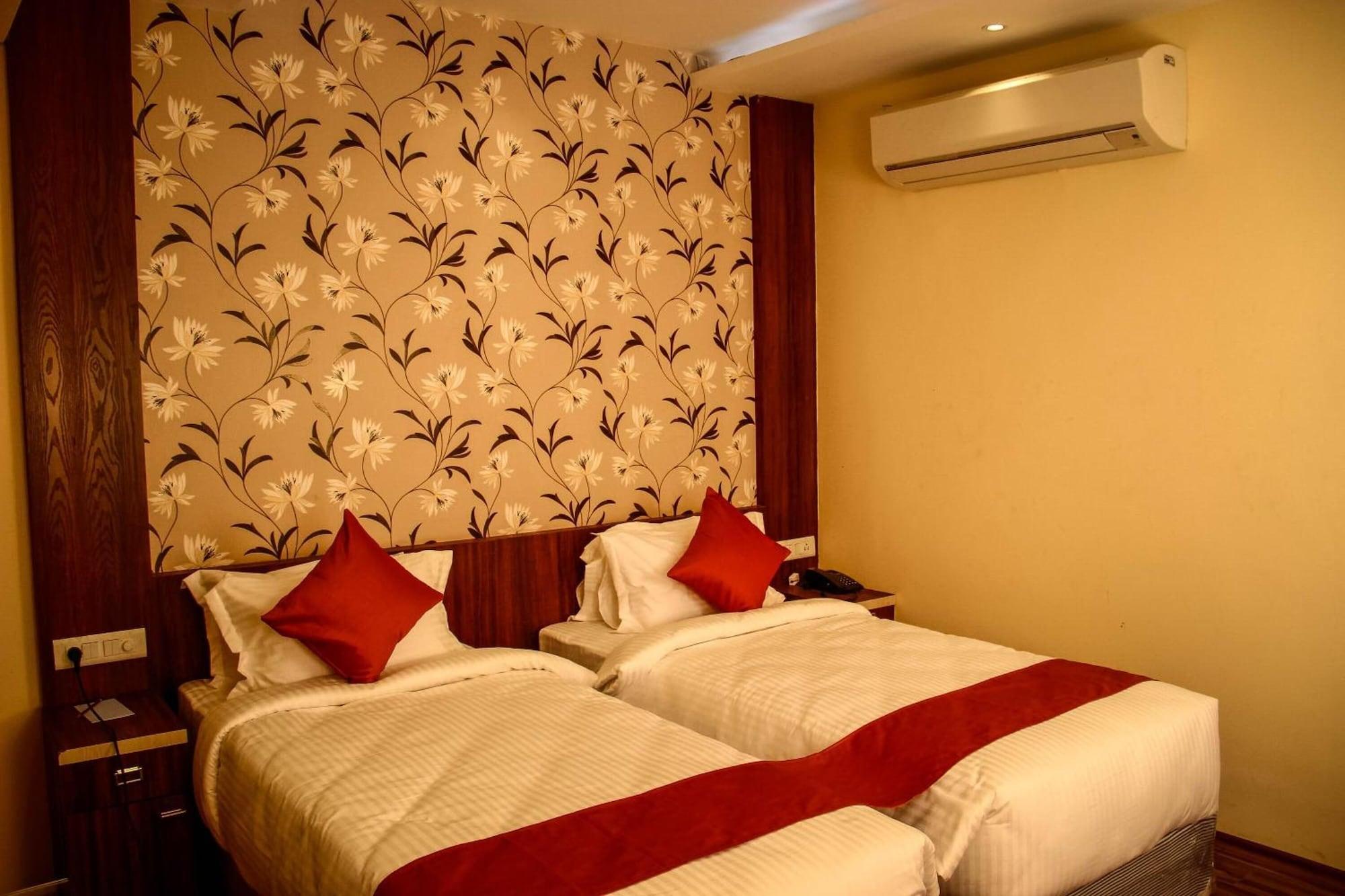 Habitación Regenta Inn Larica