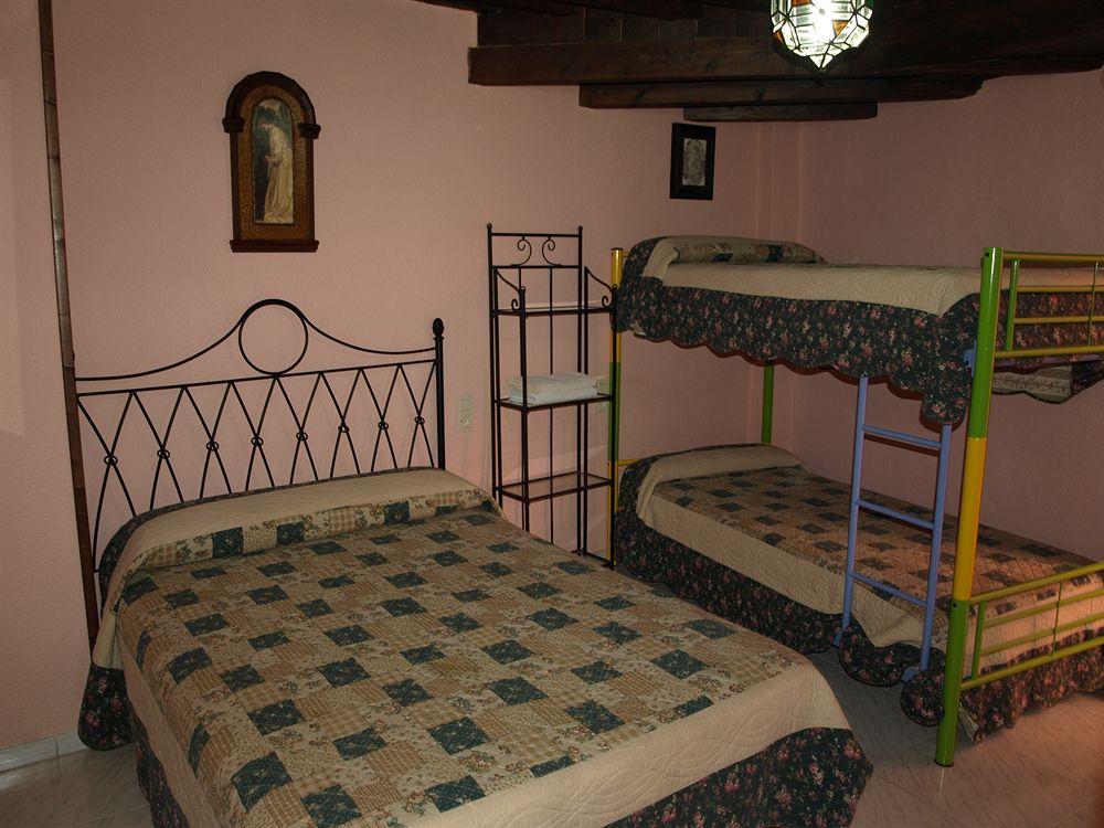 Habitación Apartamentos La Miga