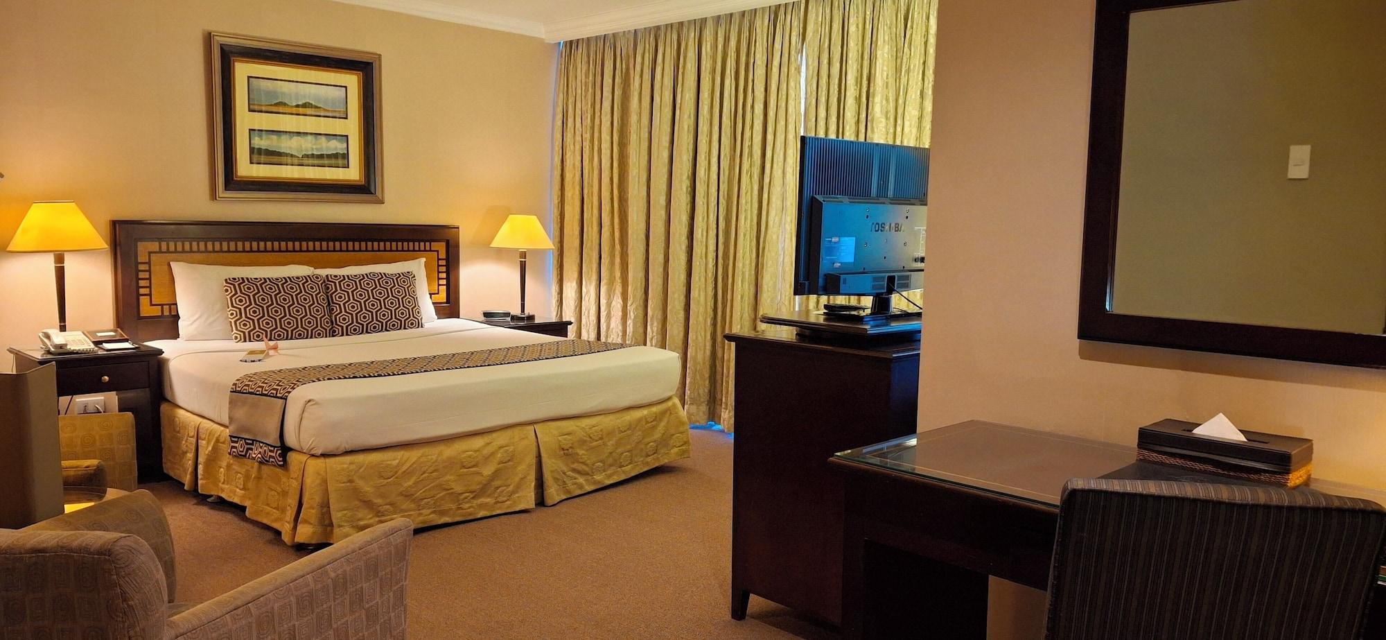 Habitación Herald Suites Solana