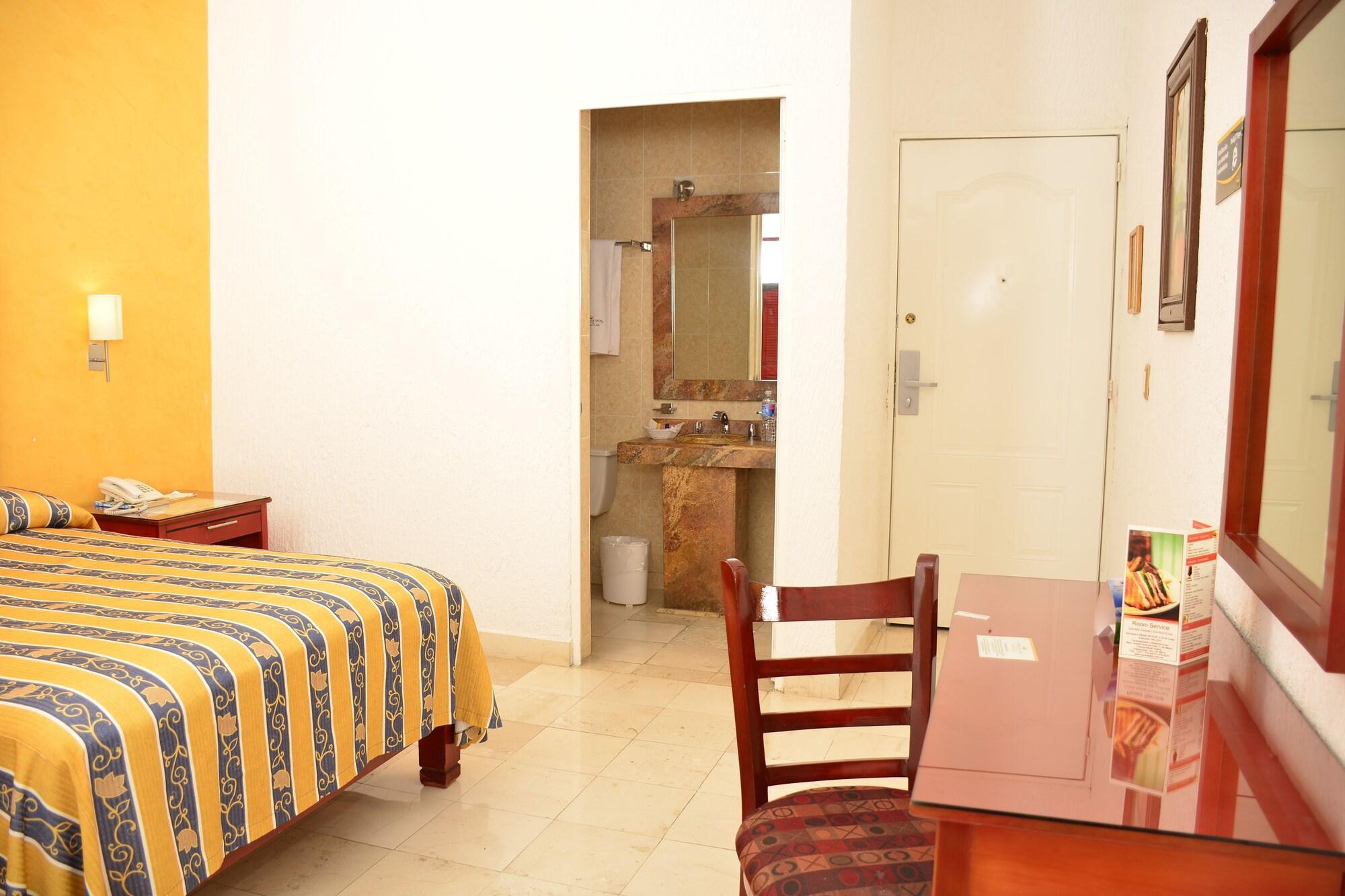Habitación Paradise Inn