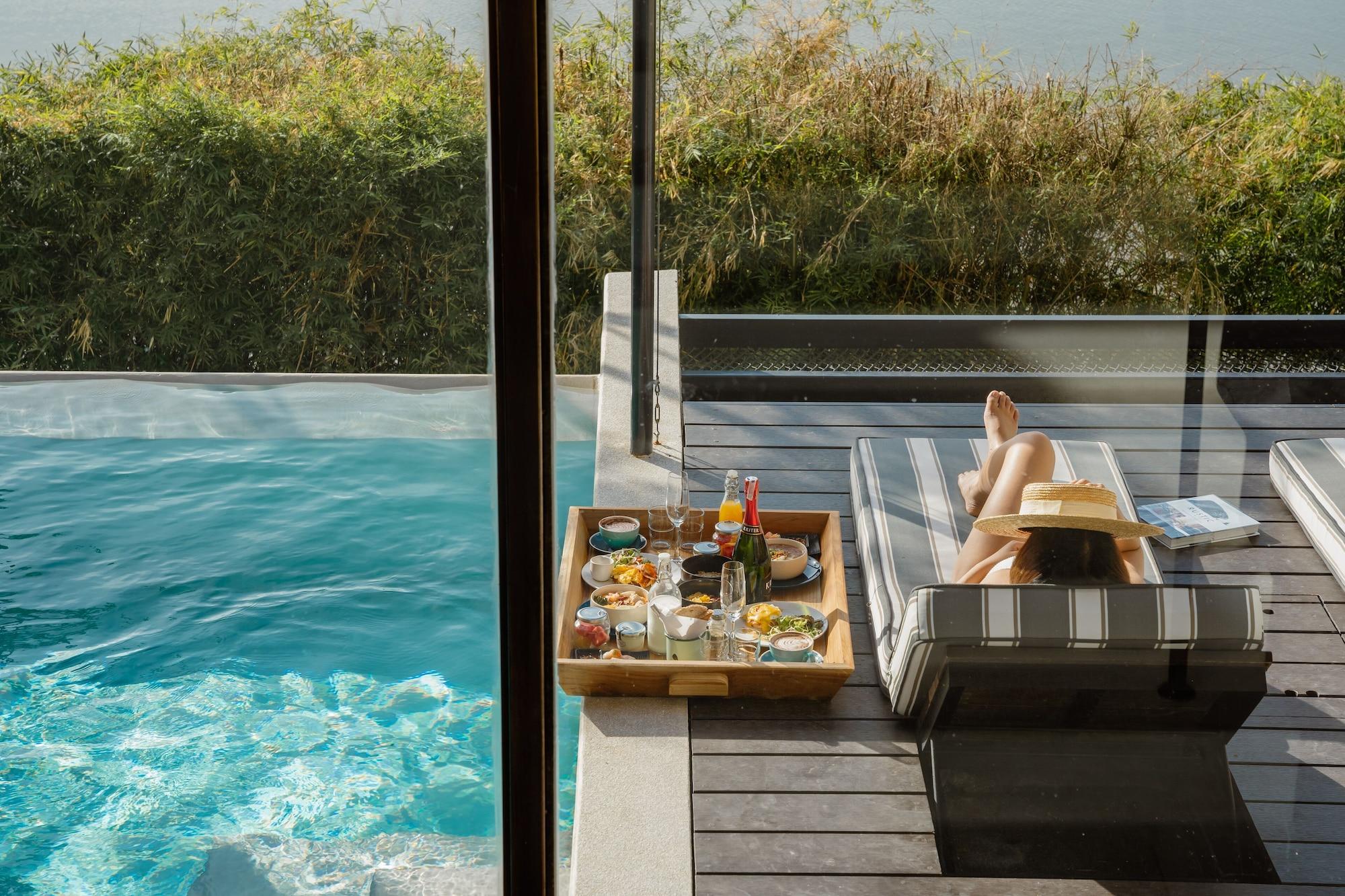 Vista Piscina The Xcape River Kwai