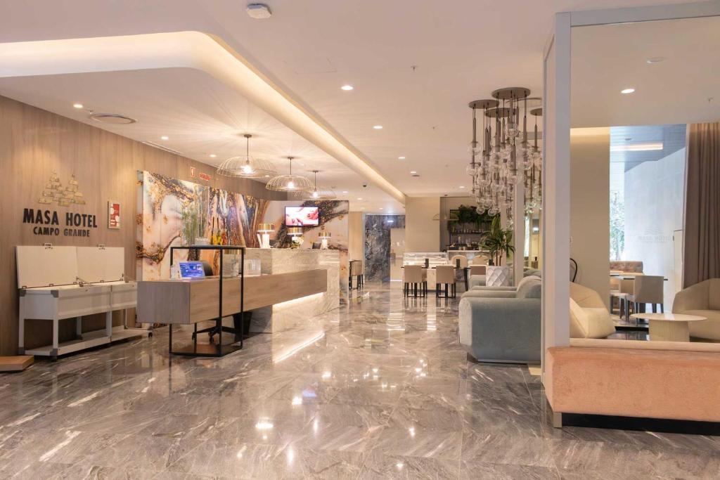 Vista Lobby Masa Hotel Campo Grande