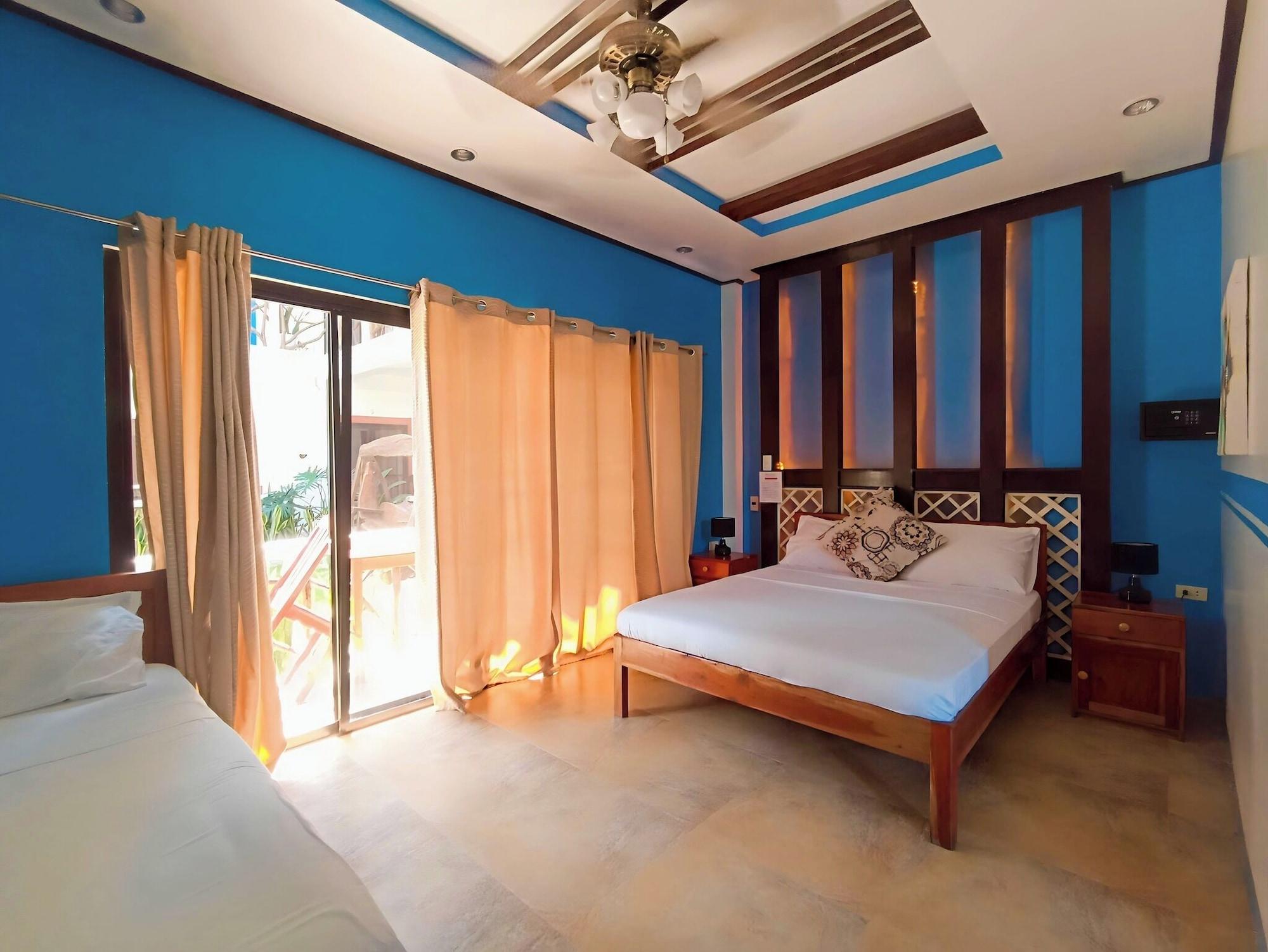 Habitación Hotel Oasis Port Barton