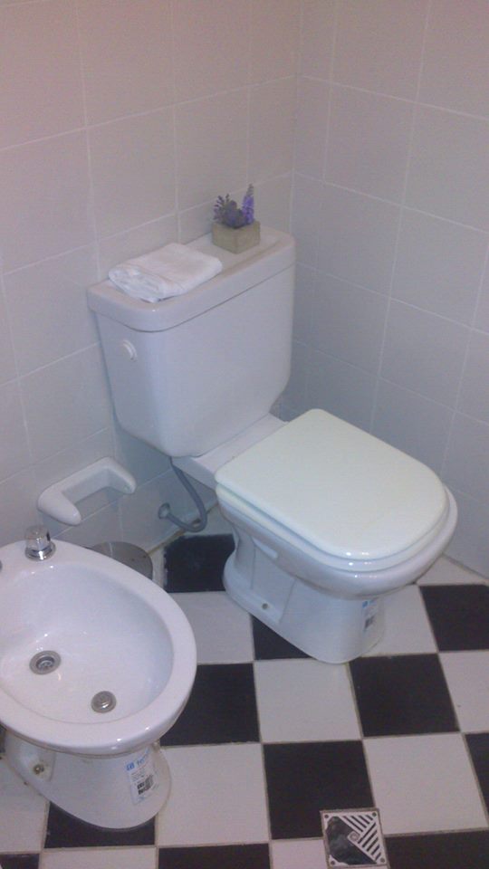 Baño Kusisa Hostal