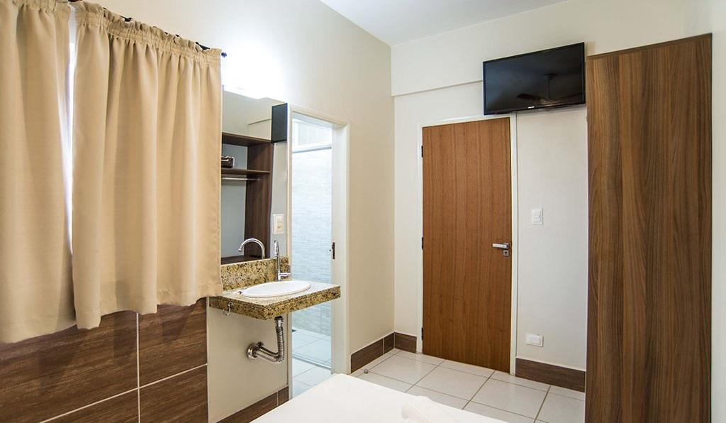 Comodidades do quarto Hotel Fenix