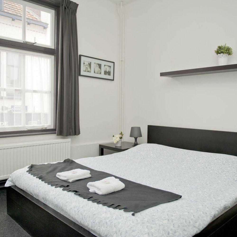 Habitación Hotel-O-Theek de Zwaan / Budgethotel