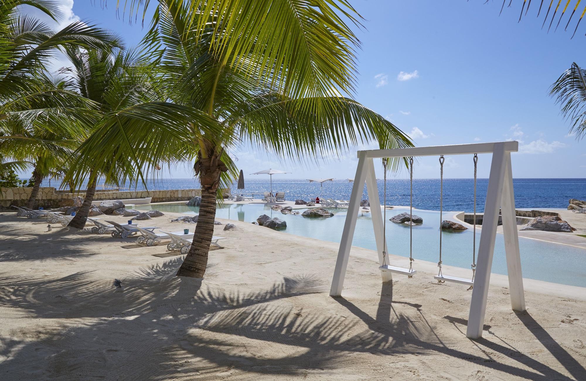 Gimnasio TRACADERO Beach Club and Holidays Rentals