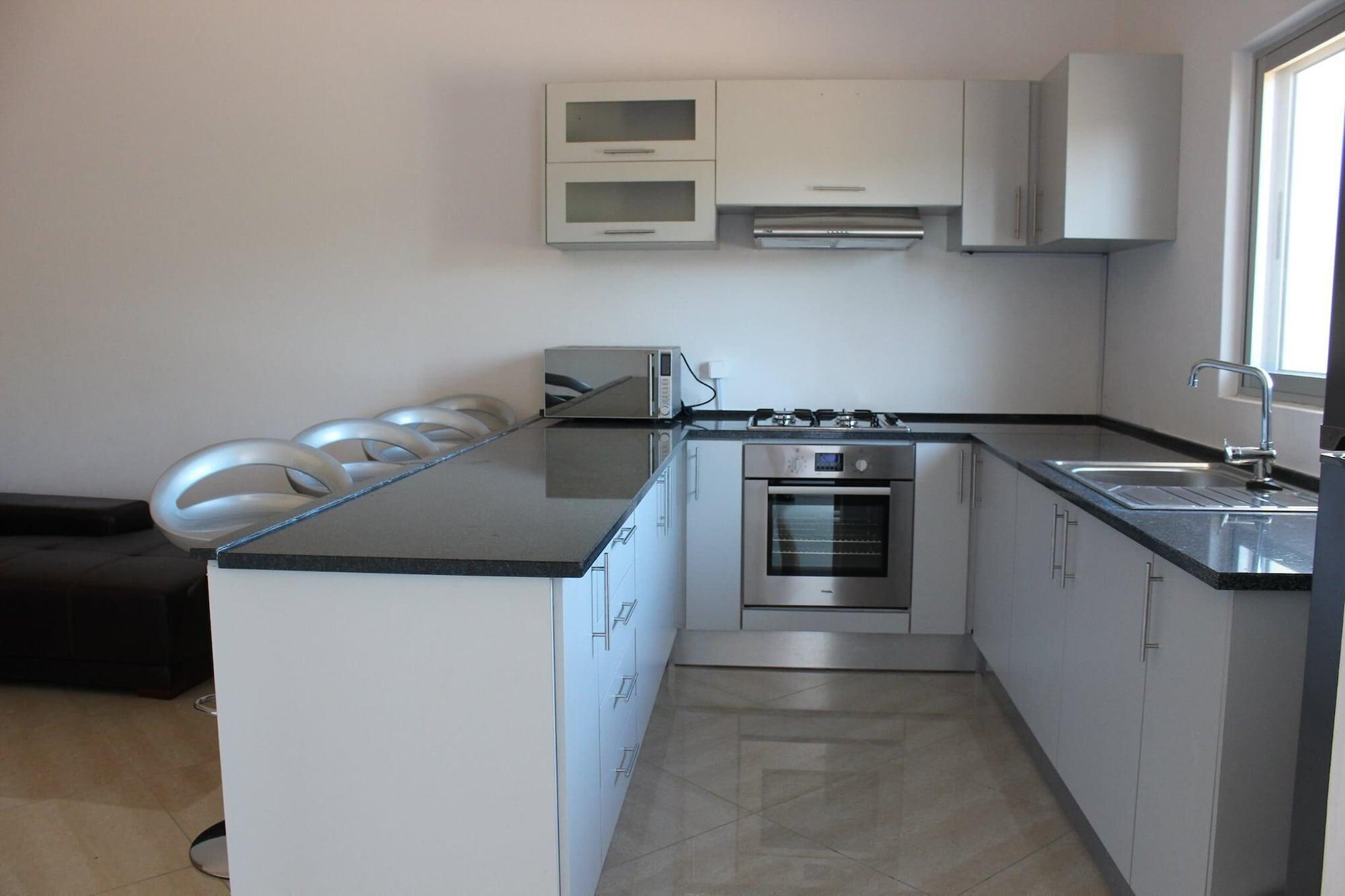 Equipamiento de Habitación Rezz Aparthotel