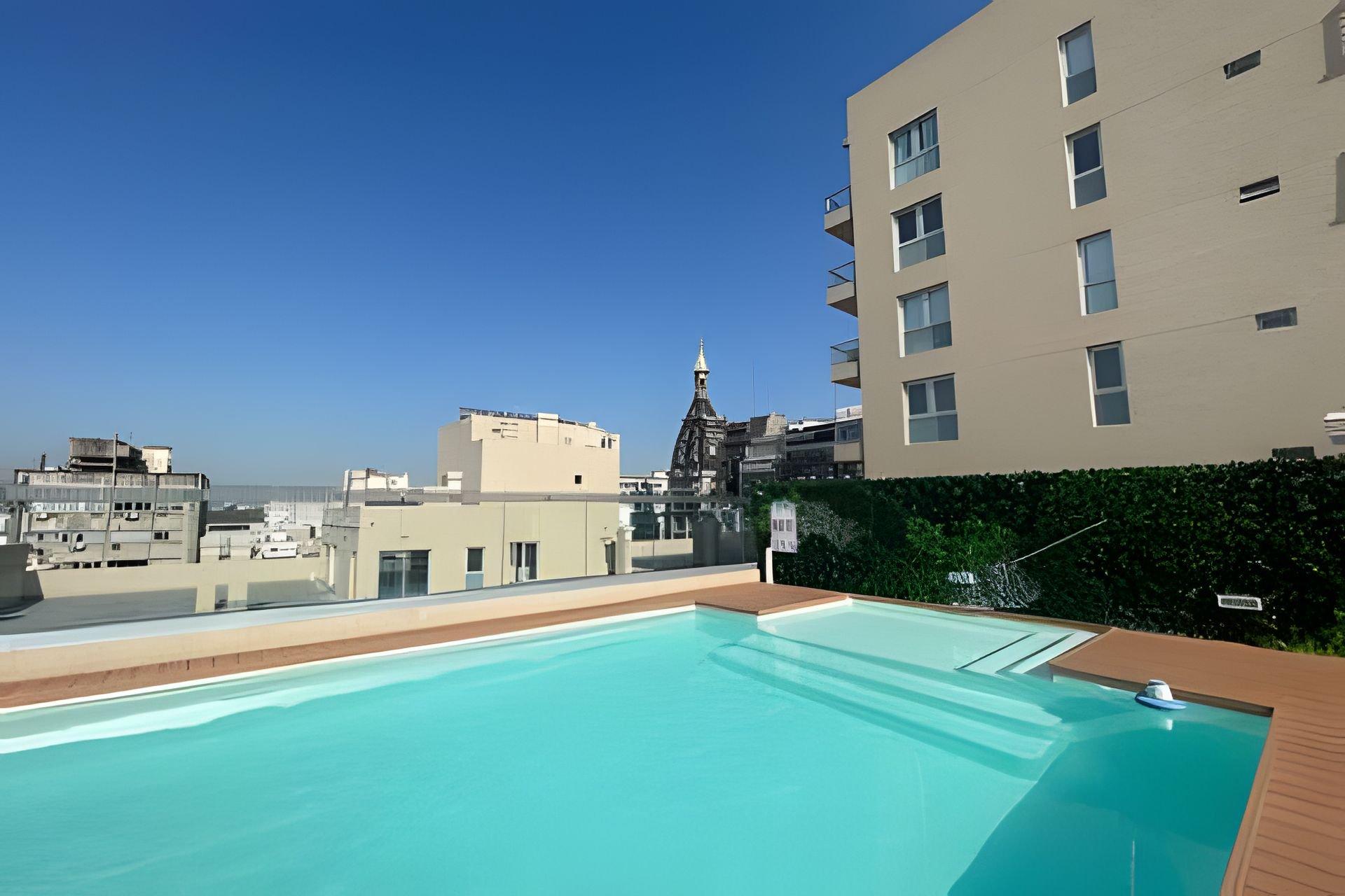 Vista Piscina San Telmo calido Departamento
